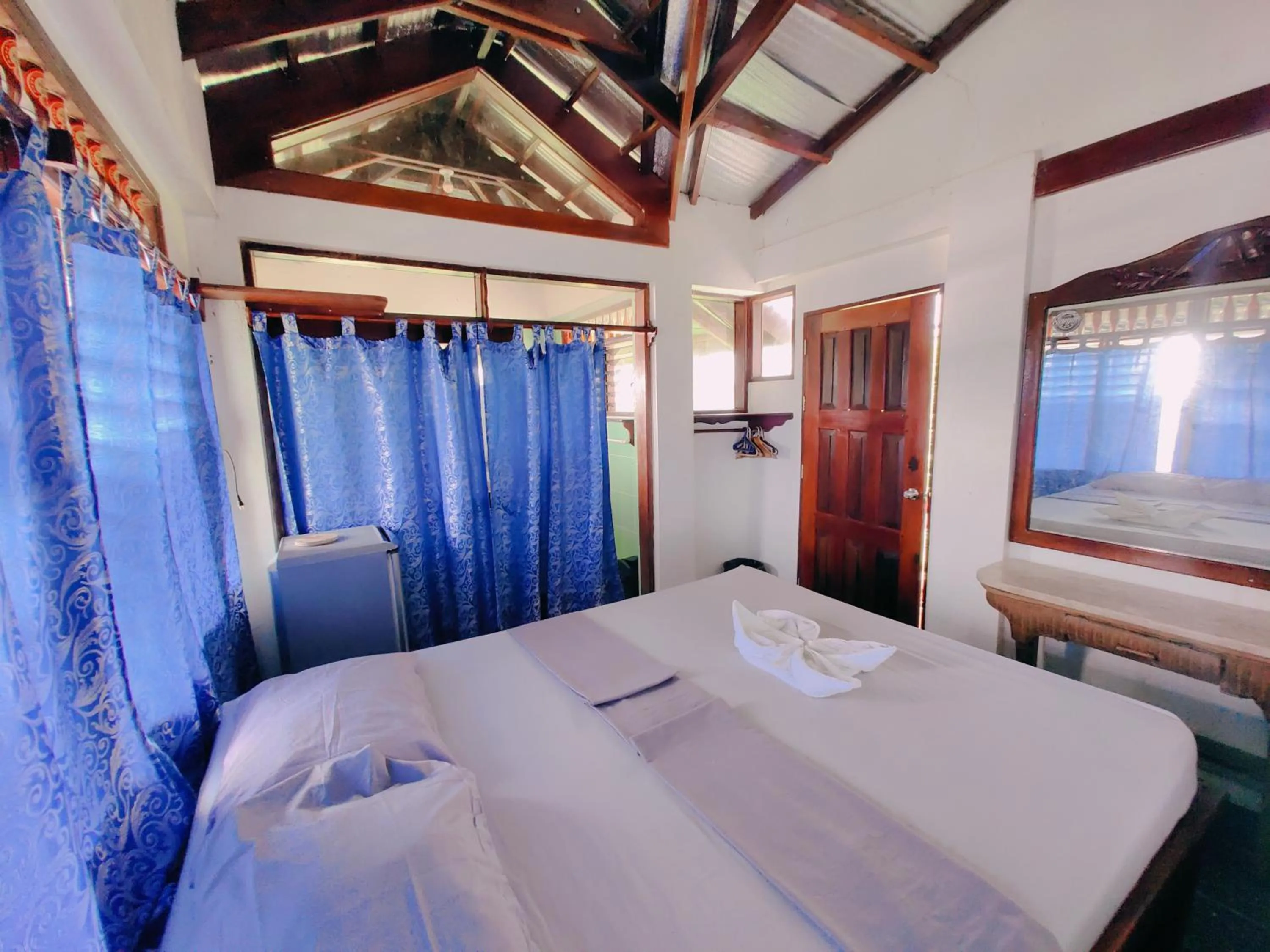 Bedroom, Bed in Patrick's on the Beach Resort