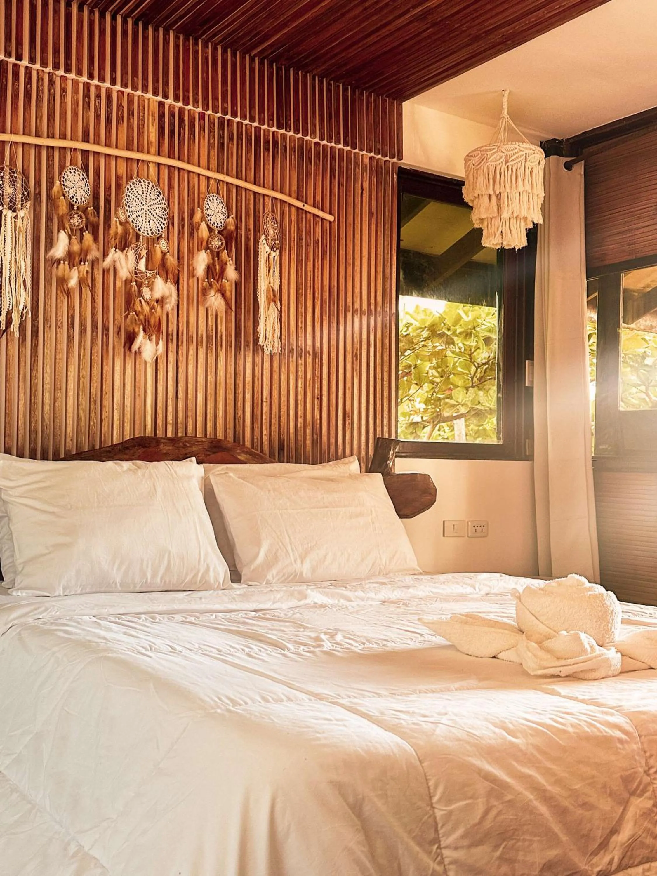 Photo of the whole room, Bed in Patrick's on the Beach Resort