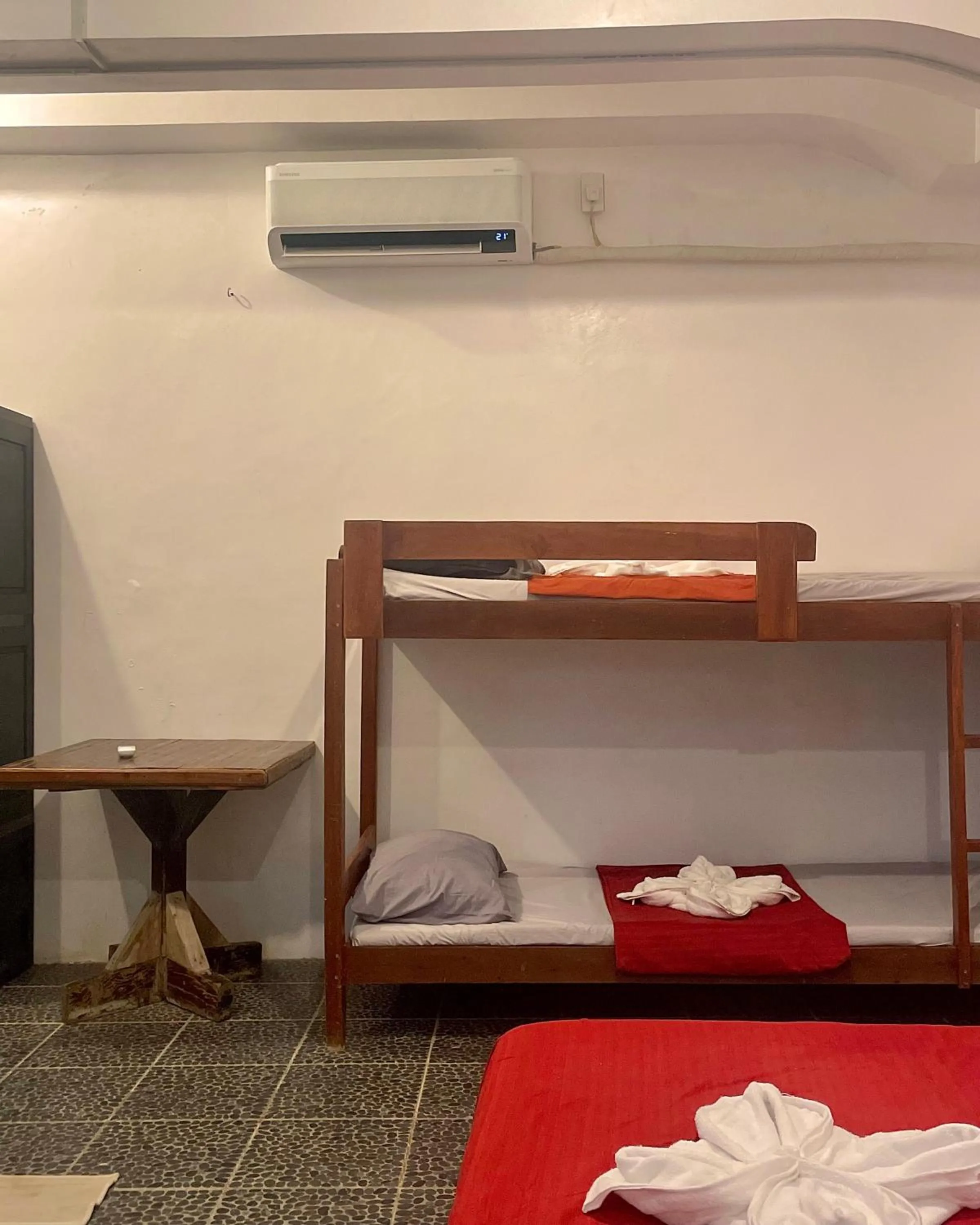 Bed in Patrick's on the Beach Resort