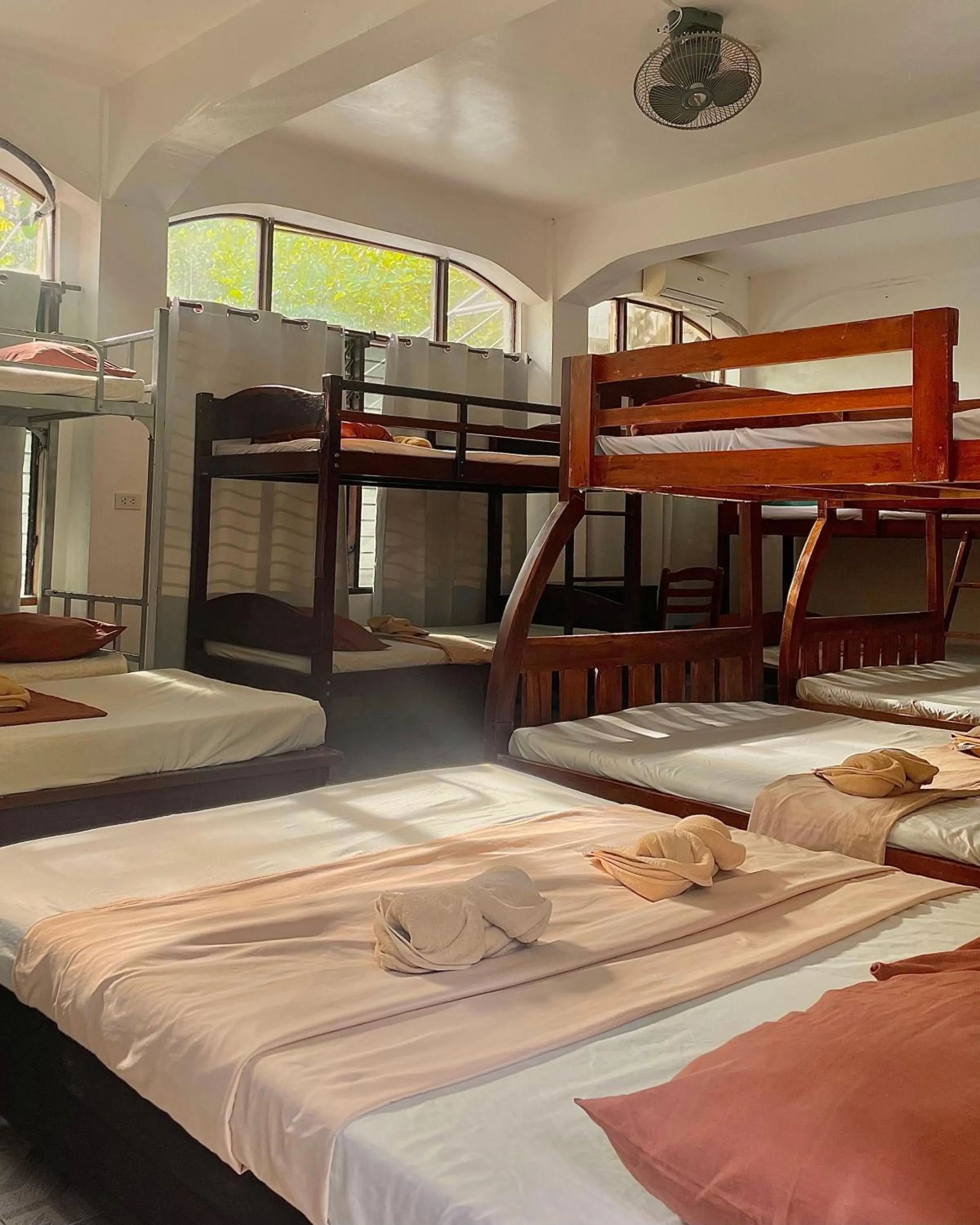 Bed in Patrick's on the Beach Resort