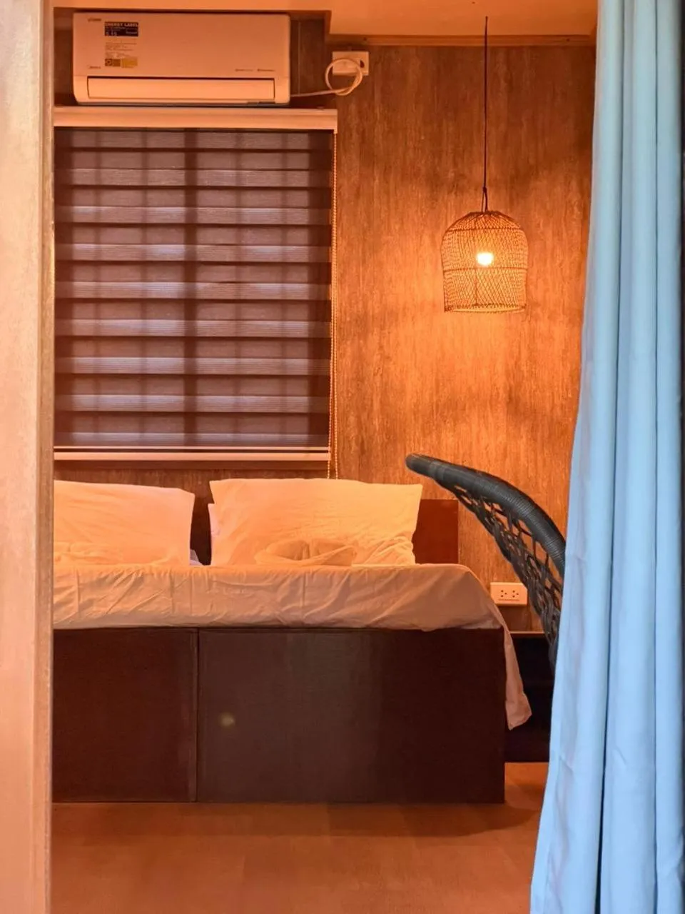 Bed in Patrick's on the Beach Resort