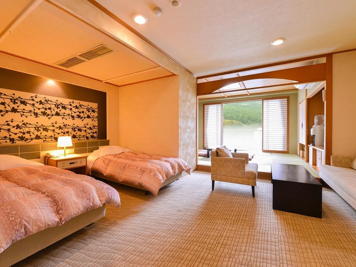 Bed in Ooedo Onsen Monogatari Premium Hotel New Shiobara