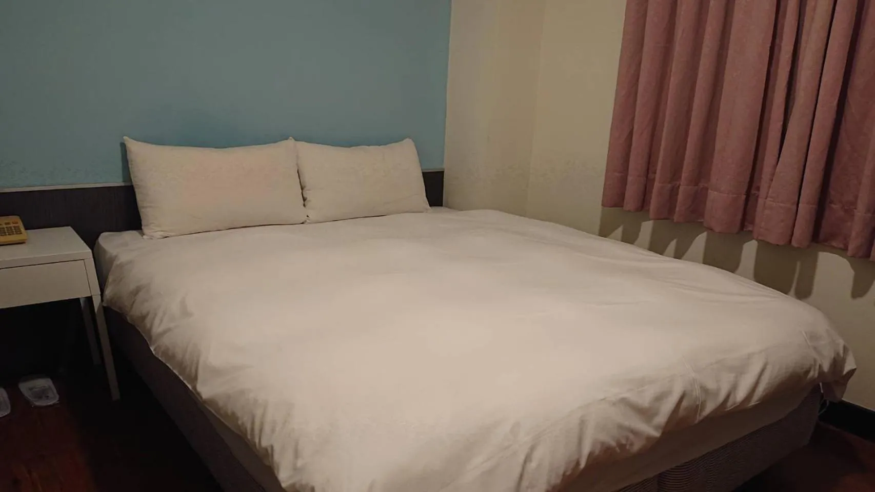 Bed in Wan Tai Hotel