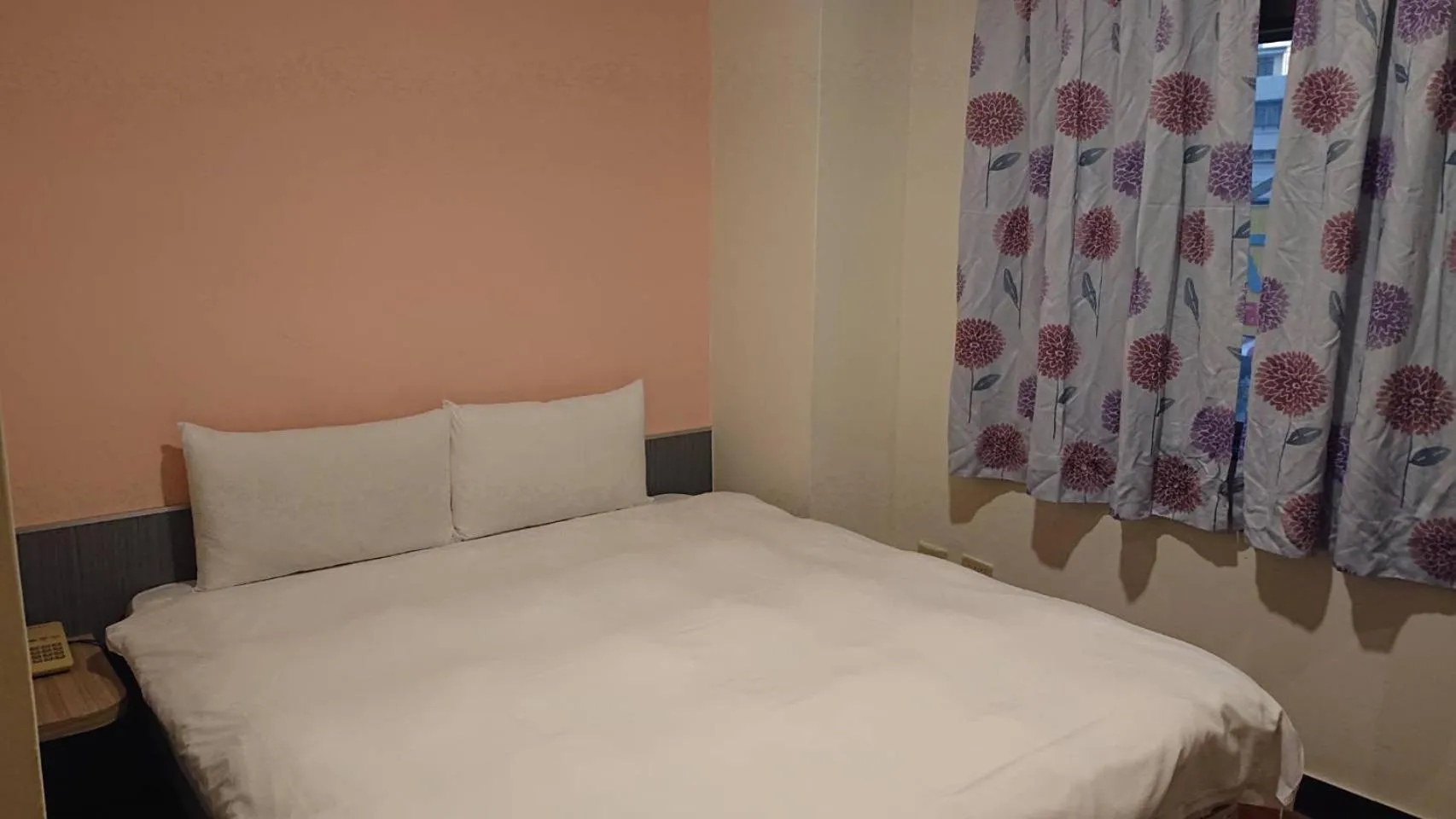 Bed in Wan Tai Hotel