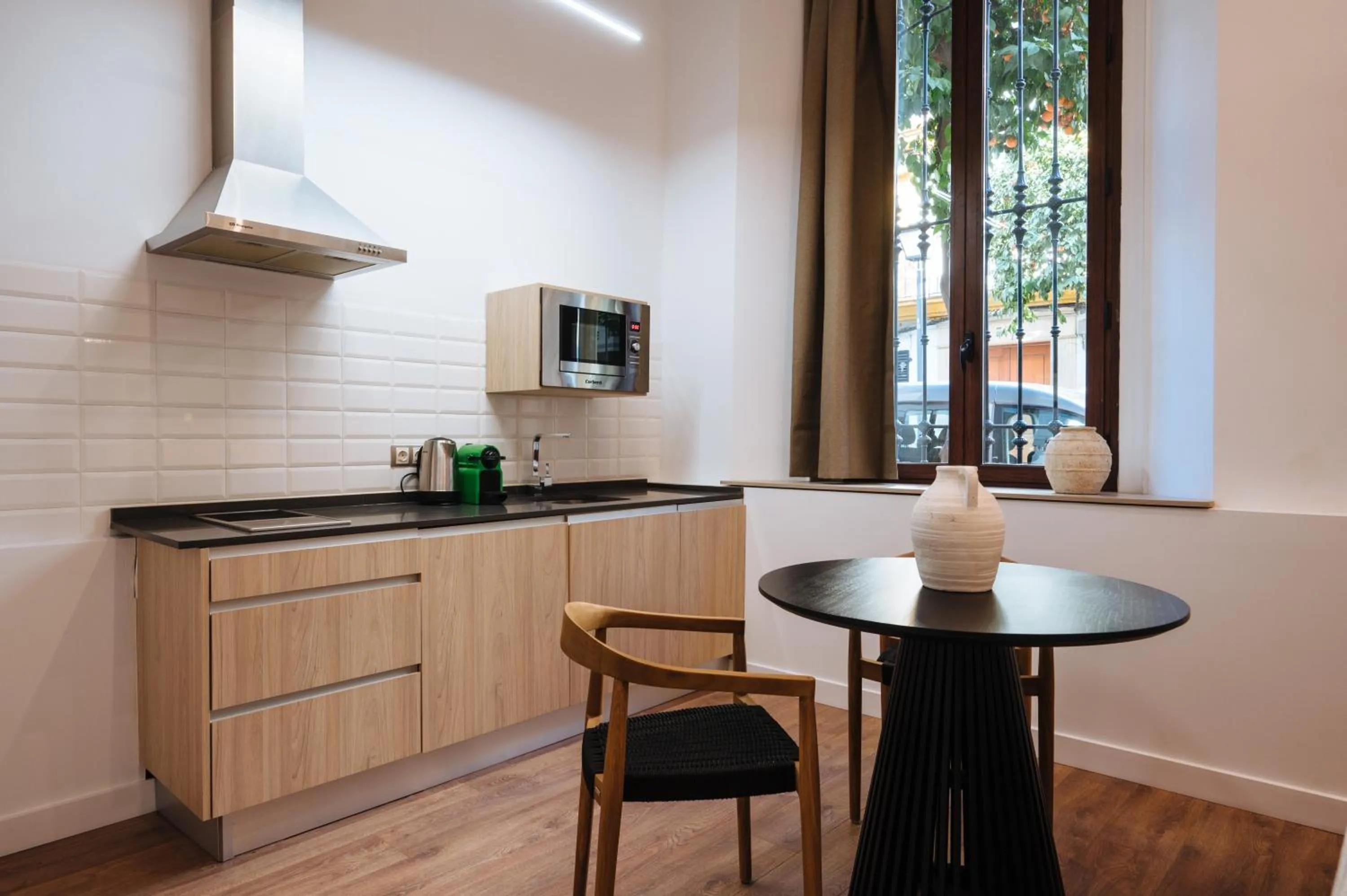 Kitchen or kitchenette in Apartamentos "El Escondite de María"