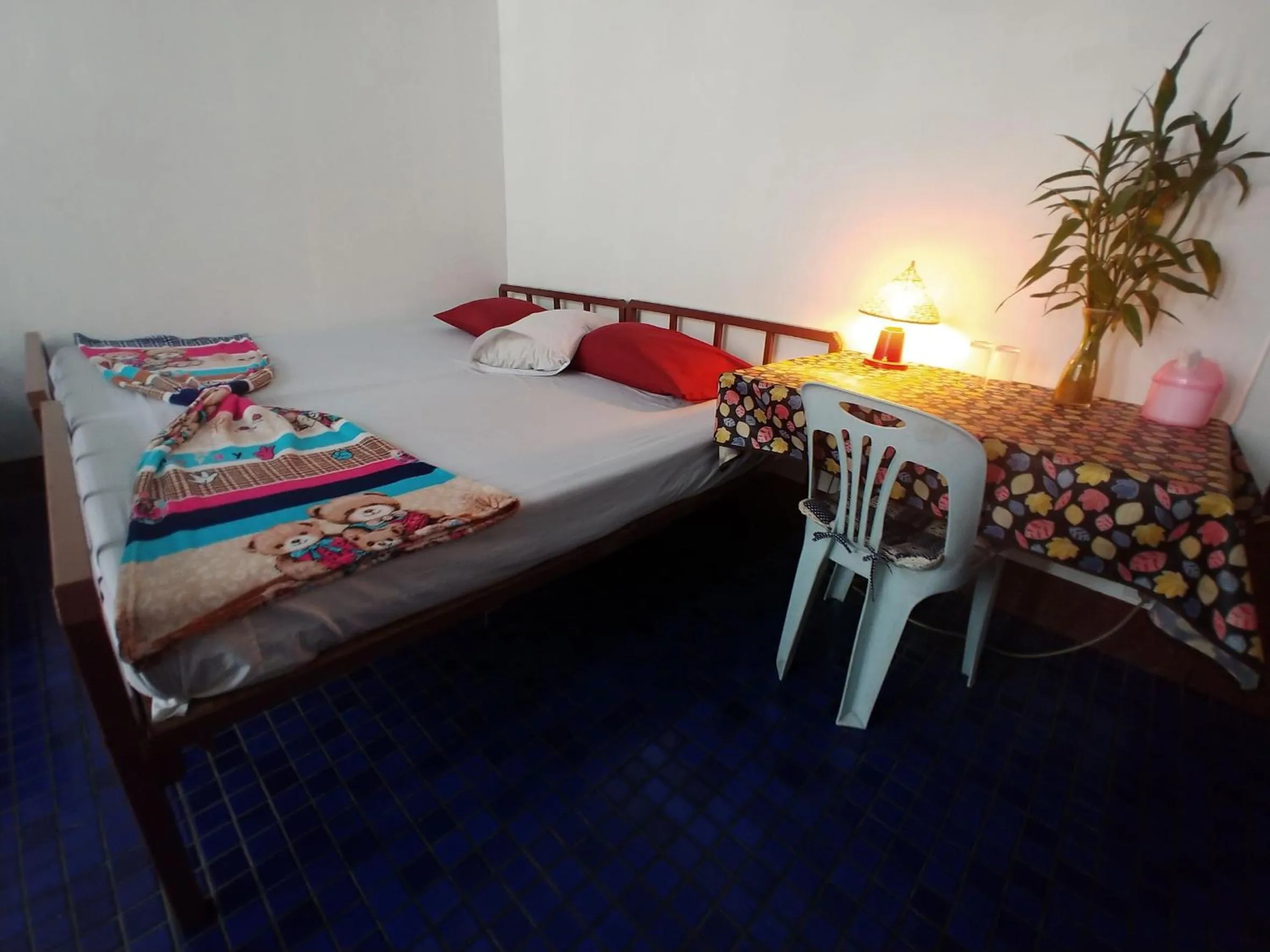 Bed in Prasuri Guest House