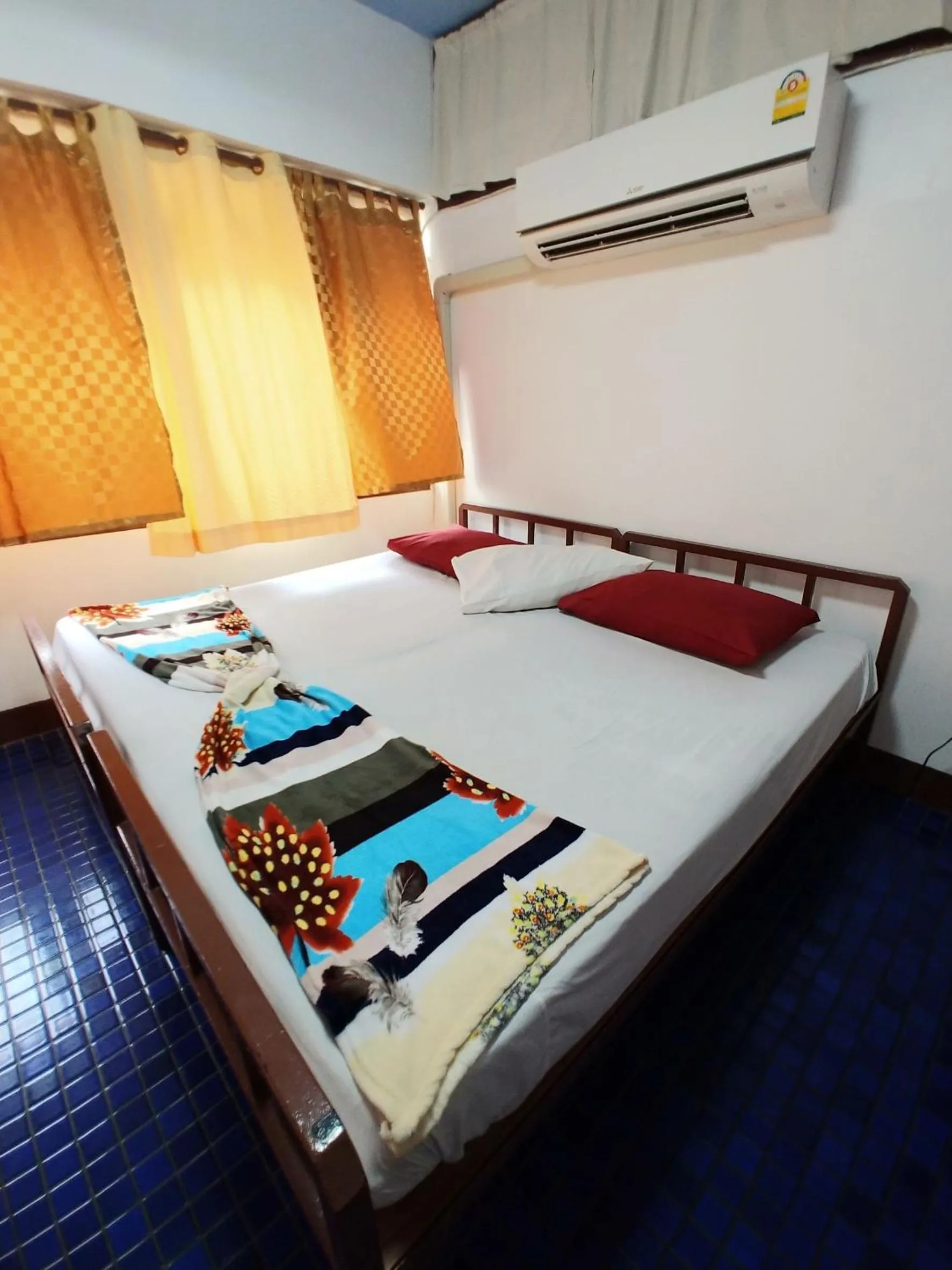 Bed in Prasuri Guest House