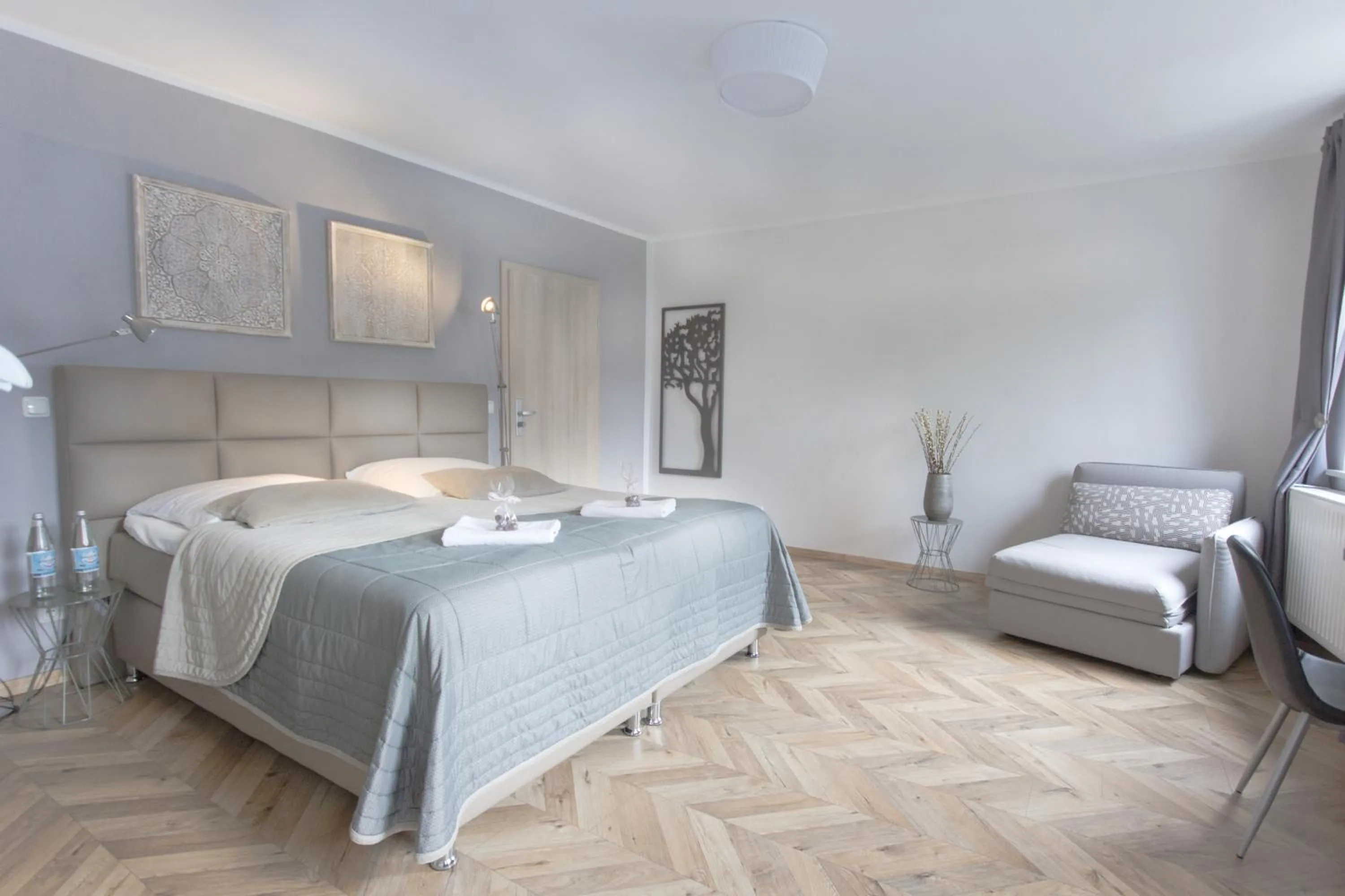 Photo of the whole room, Bed in TM Suites