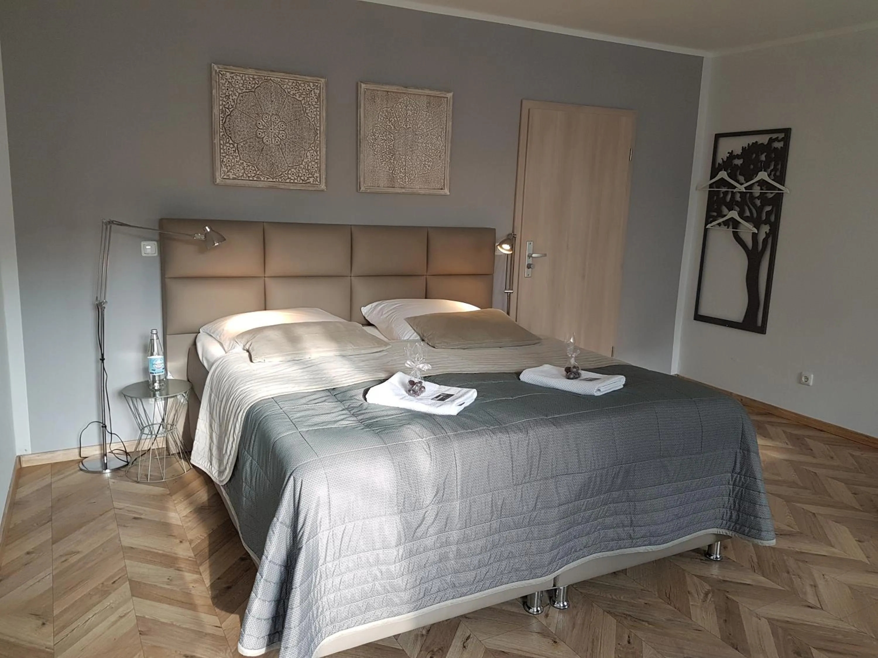 Photo of the whole room, Bed in TM Suites