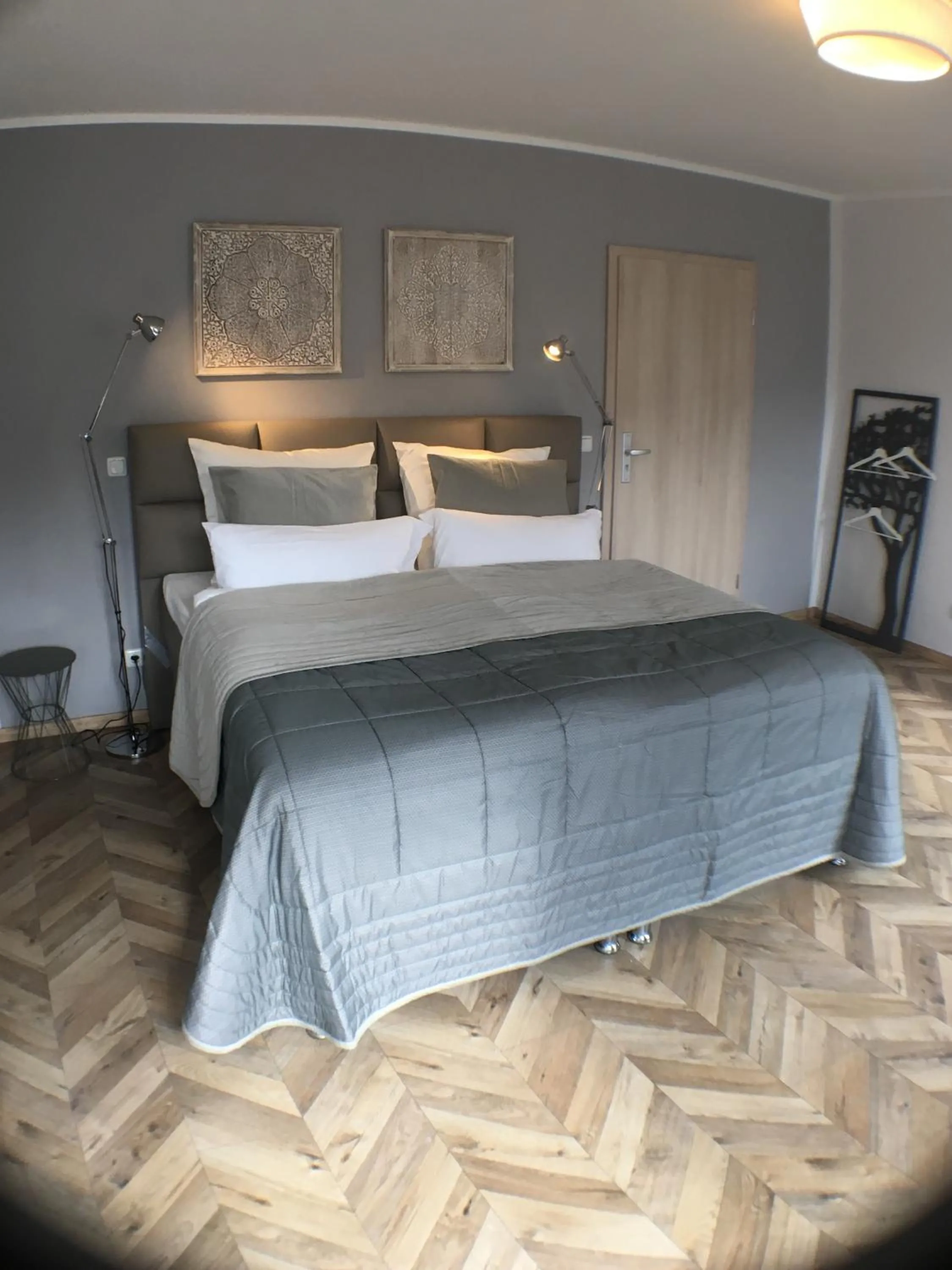 Photo of the whole room, Bed in TM Suites