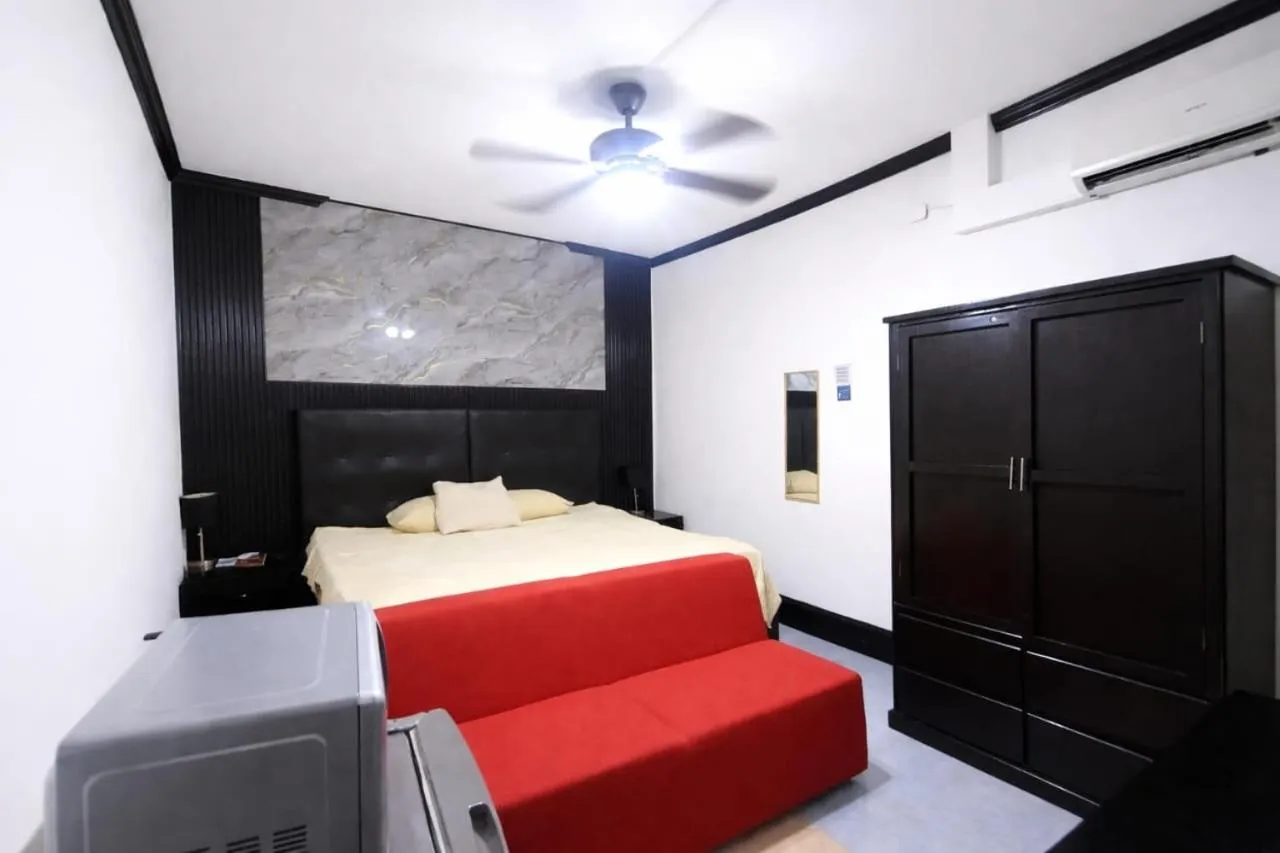 Bed in Hotel Garcias Suites, Linares