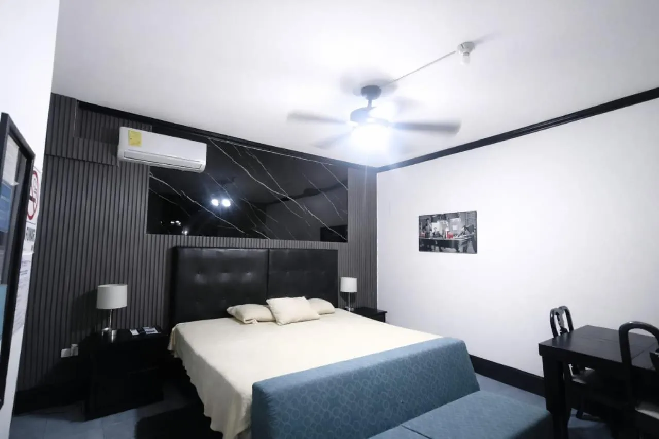 Bed in Hotel Garcias Suites, Linares