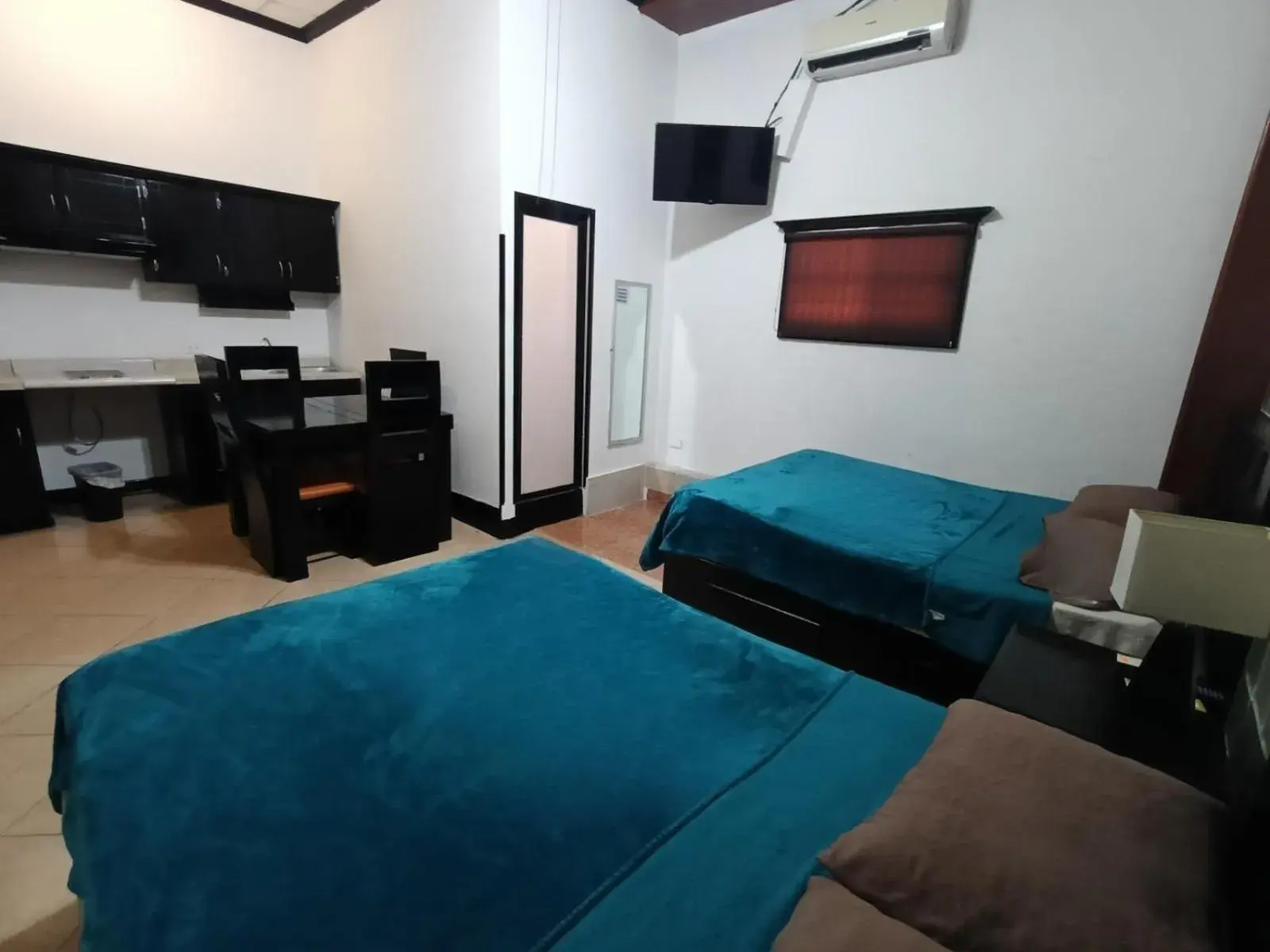 Double Room with Two Double Beds in Hotel Garcias Suites, Linares Double Room with Two Double Beds in Hotel Garcias Suites, Linares