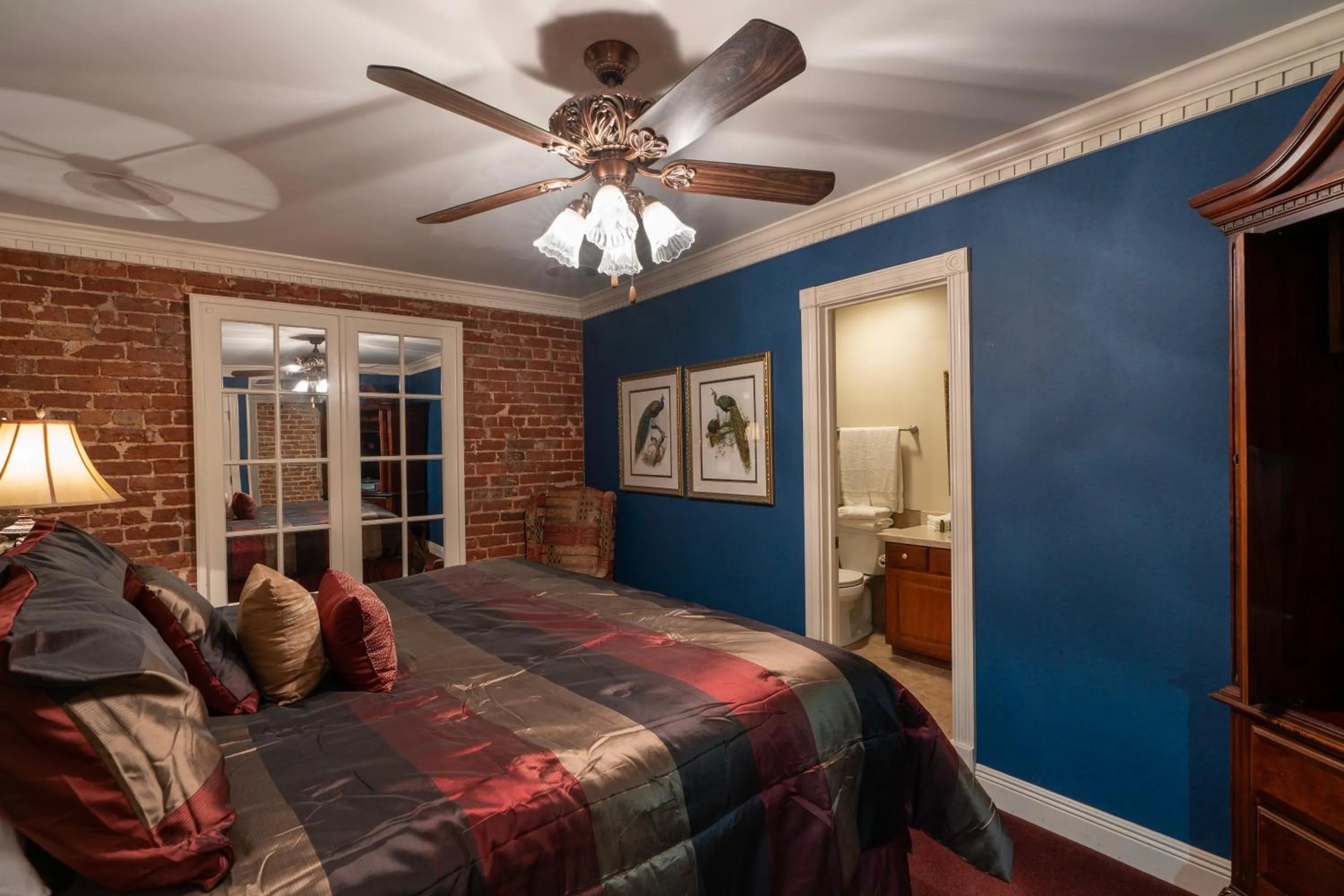 Bed in Quarter House Suites