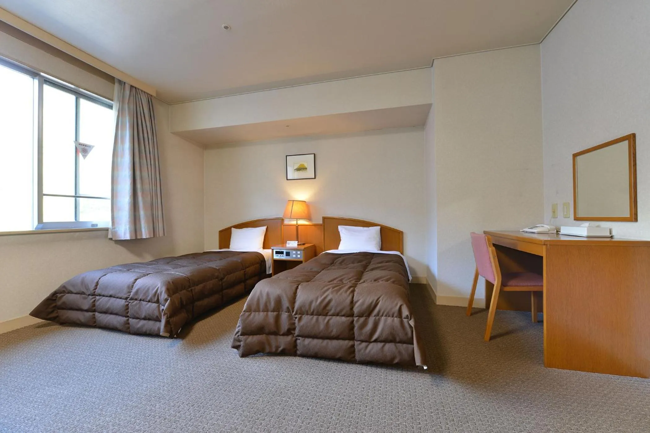 Bed in Ooedo Onsen Monogatari Hotel Kinugawa Gyoen