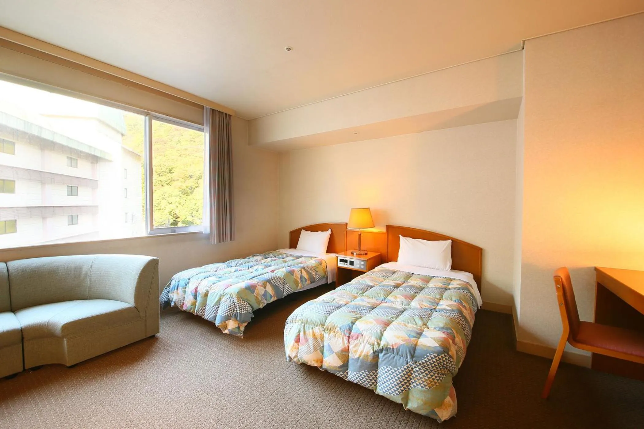 Bed in Ooedo Onsen Monogatari Hotel Kinugawa Gyoen