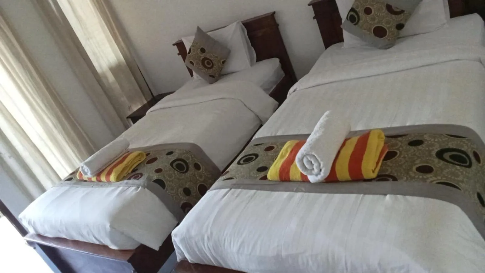 Bed in Reynold Artha Guest House