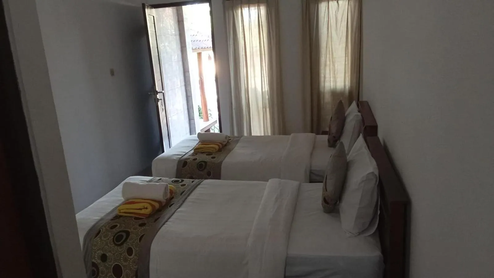 Bed in Reynold Artha Guest House