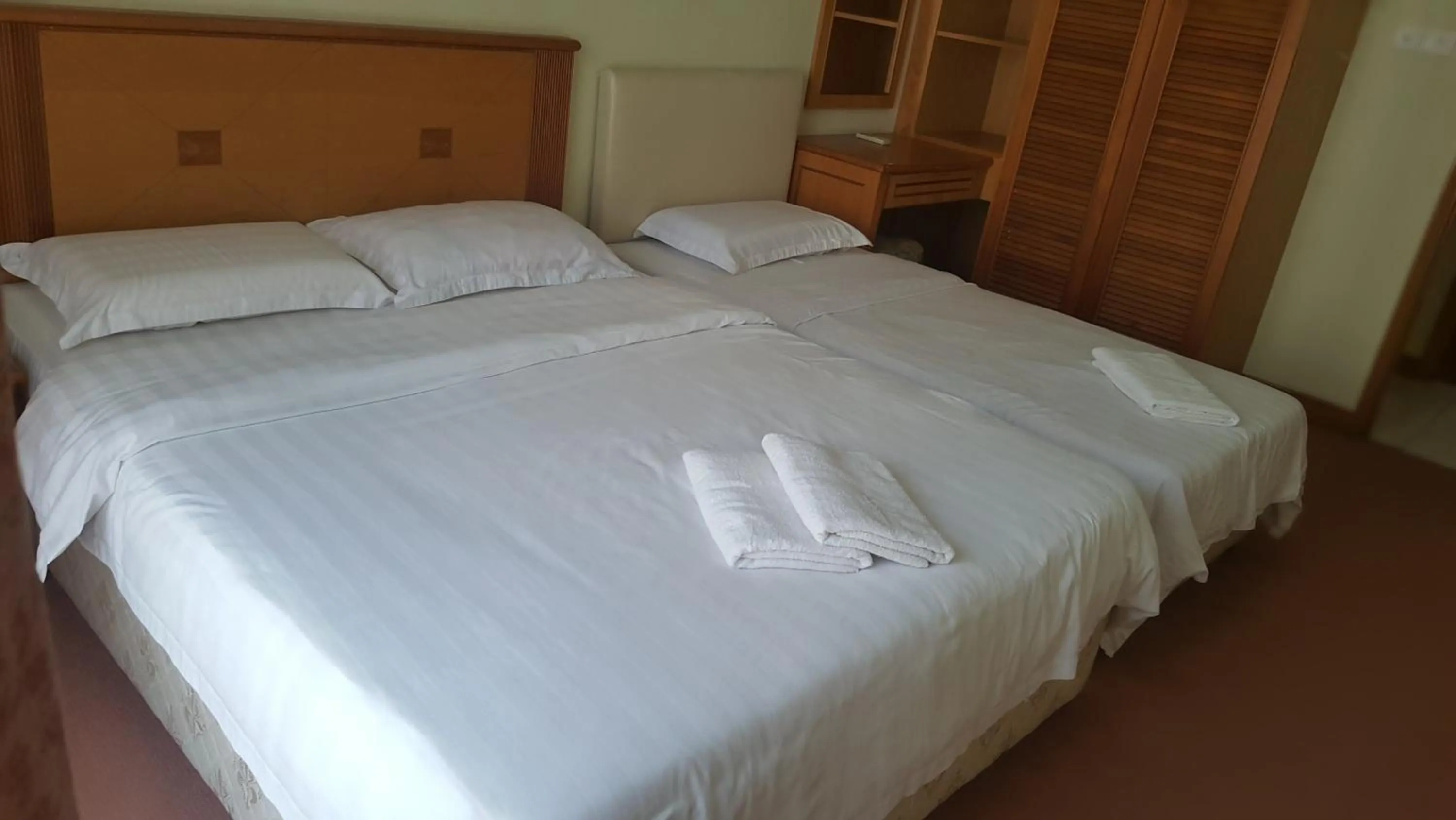 Pool view, Bed in Homestay Marina Court Resort