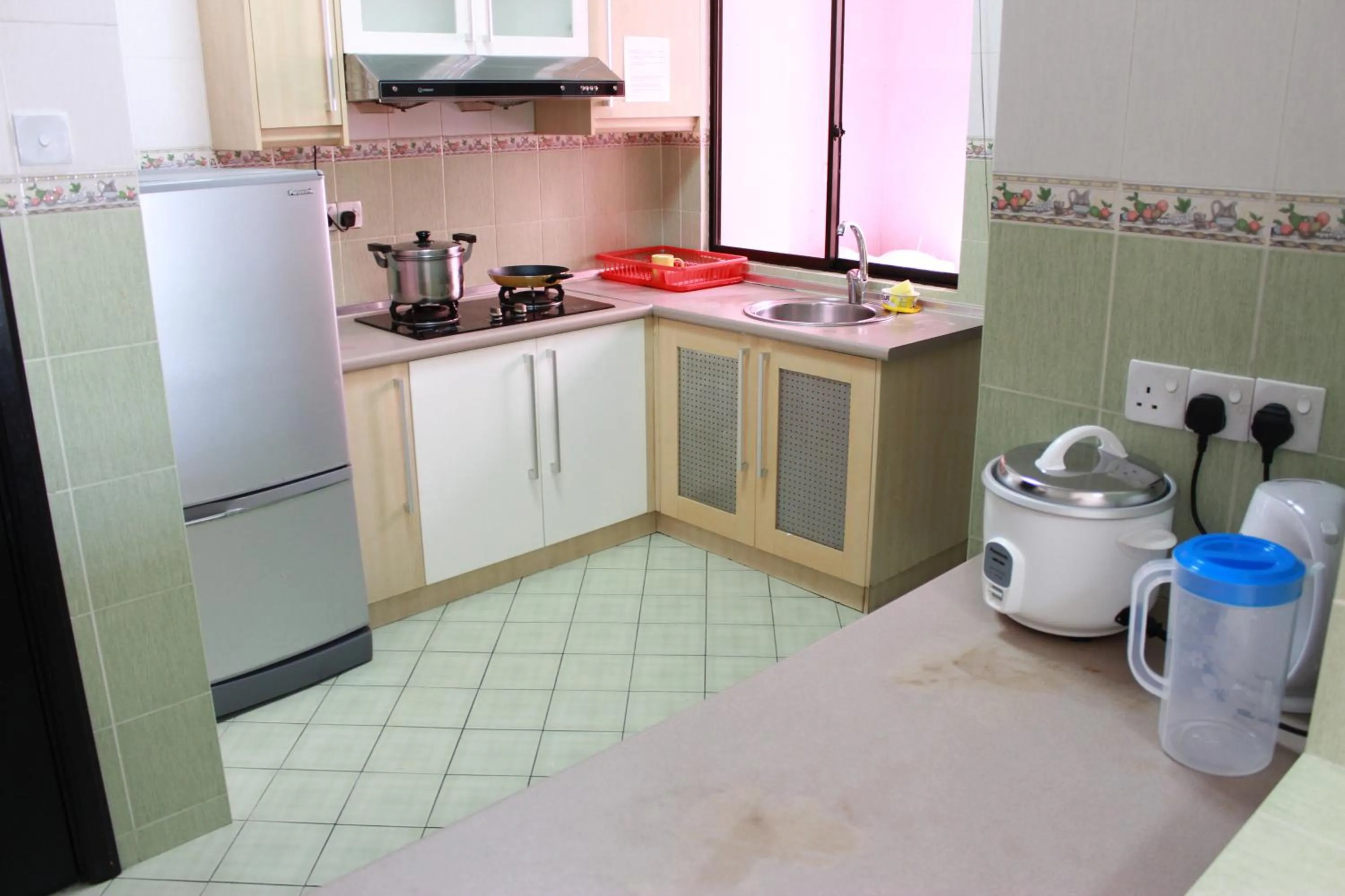 Kitchen or kitchenette in Homestay Marina Court Resort
