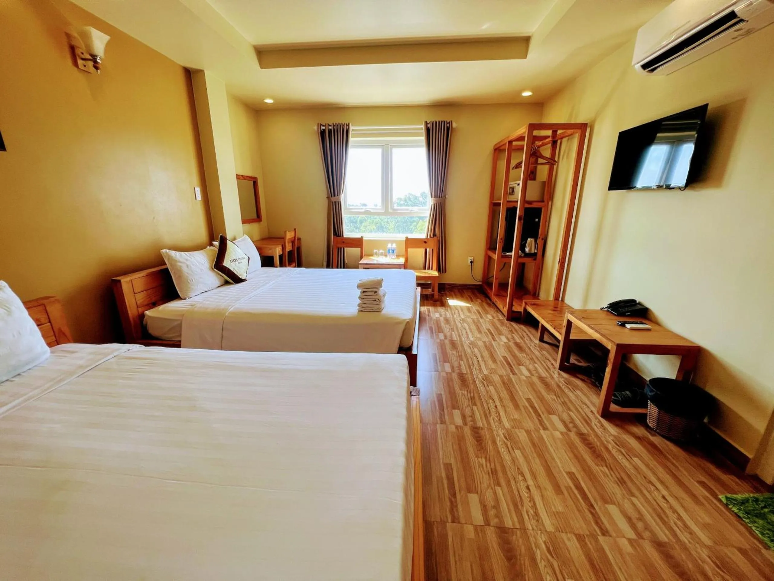 Bed in Lucky Phu Quoc Hotel