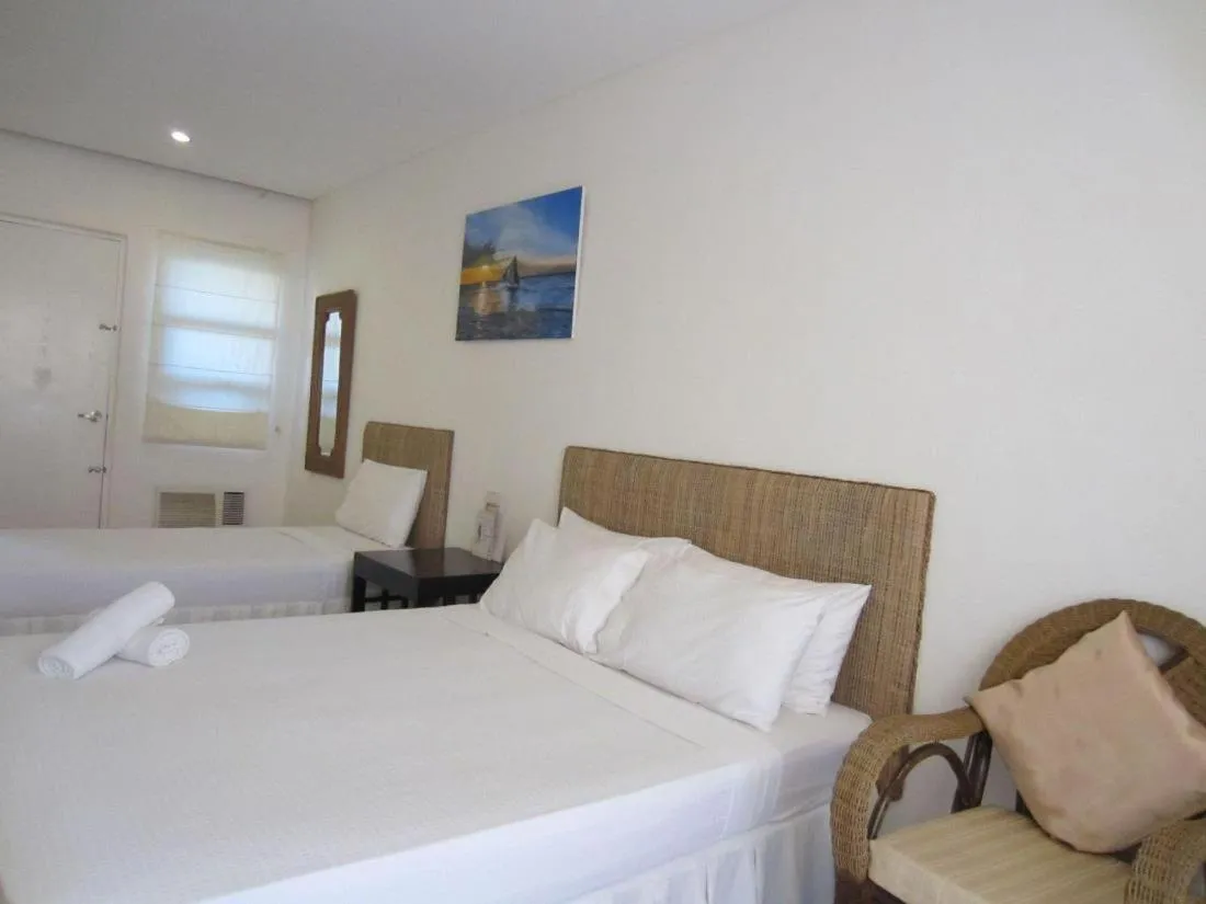 Photo of the whole room, Bed in Boracay White Coral Hotel