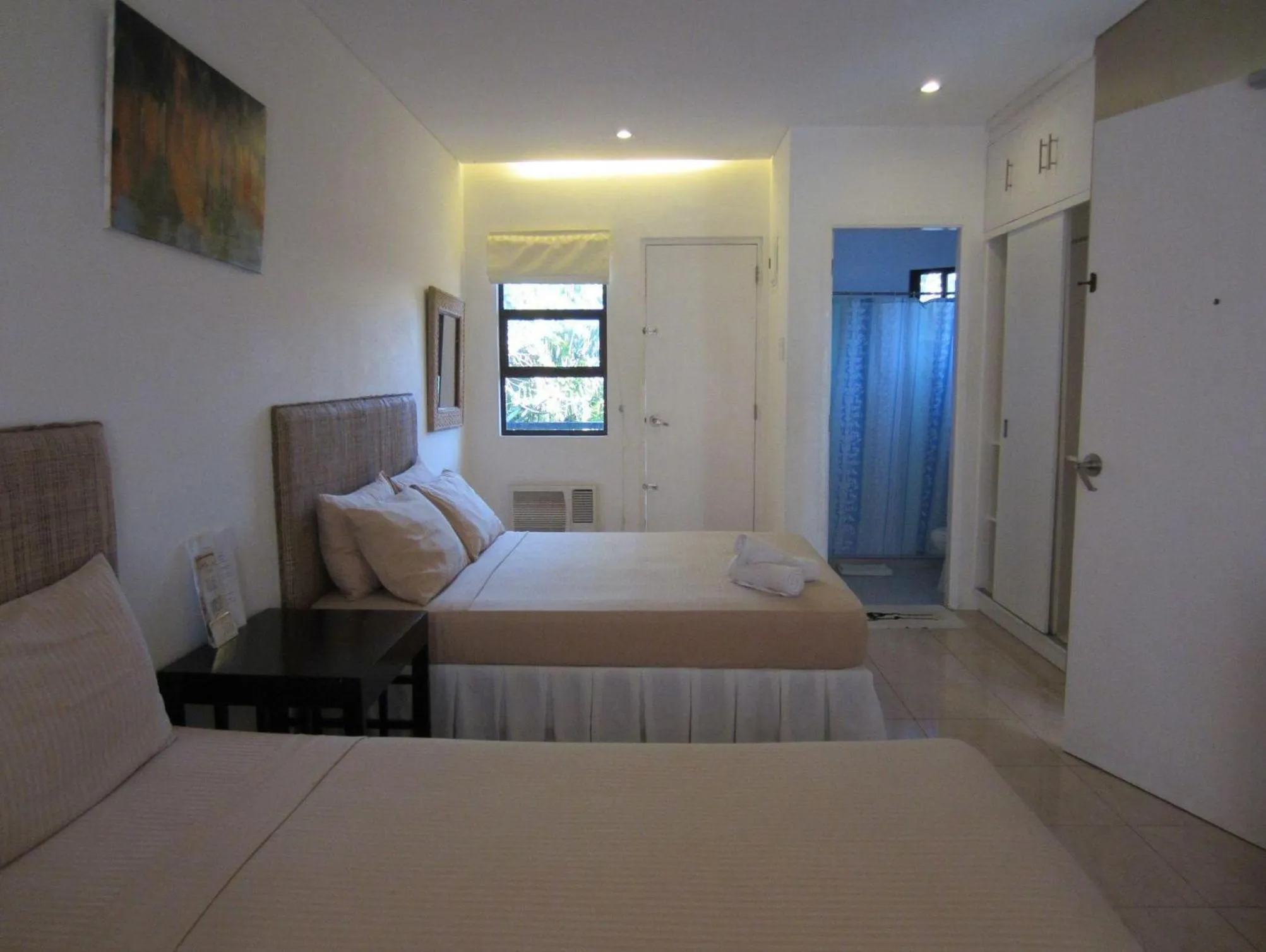 Photo of the whole room, Bed in Boracay White Coral Hotel