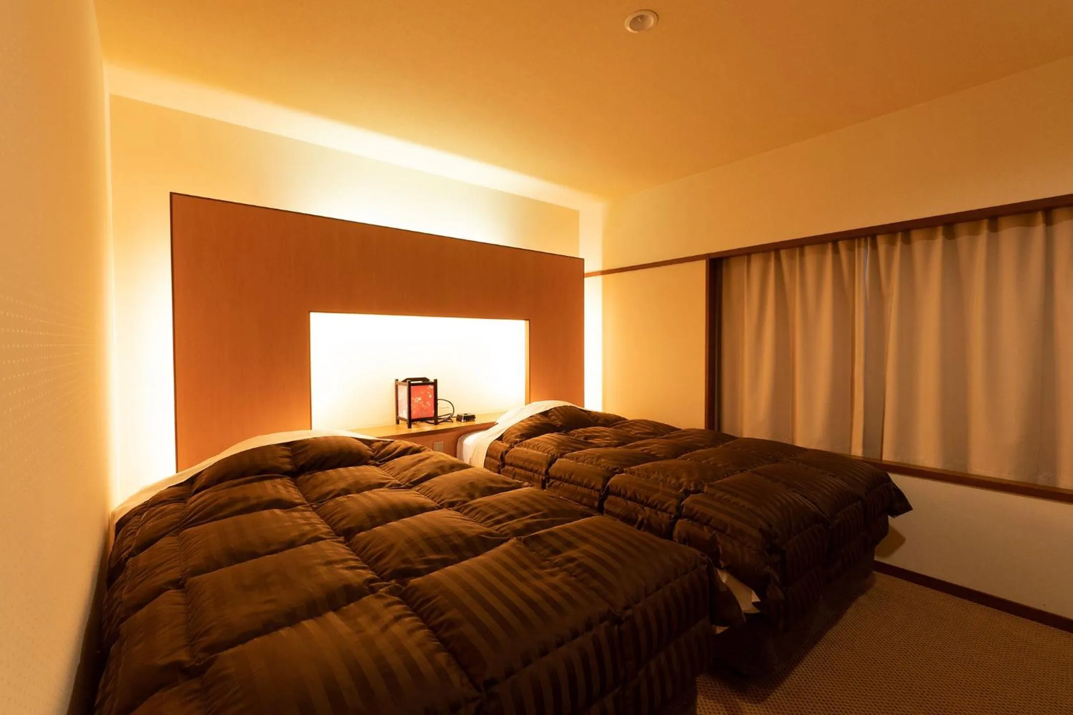 Photo of the whole room, Bed in Ooedo Onsen Monogatari Higashiyama Grand Hotel