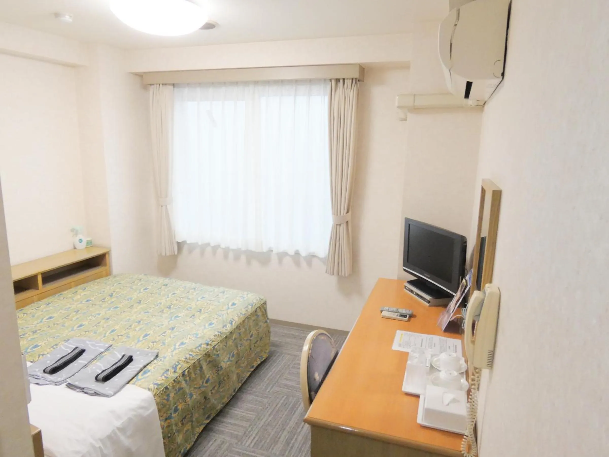 Photo of the whole room, Bed in Urban Hotel Sanko