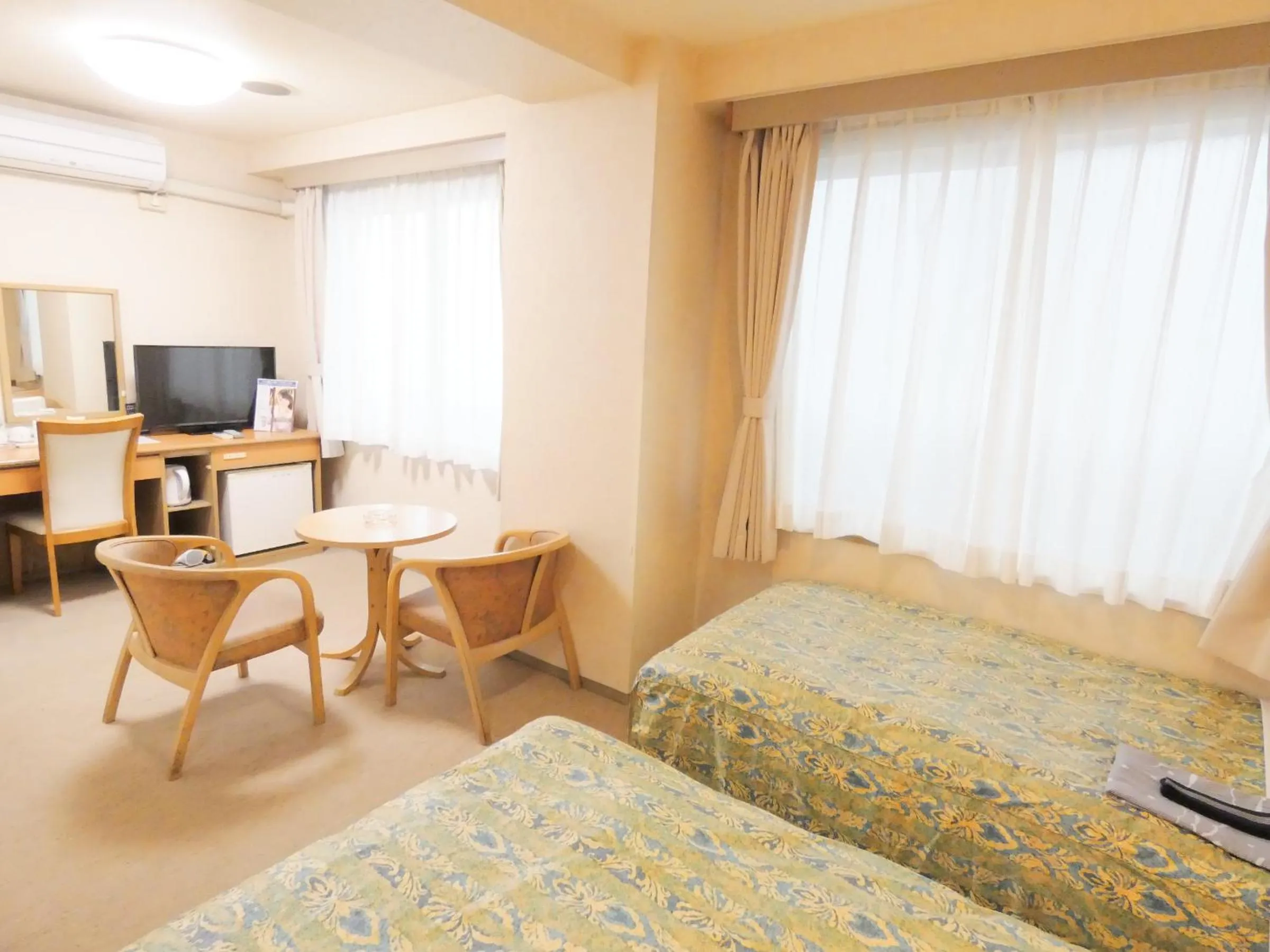 Bed in Urban Hotel Sanko