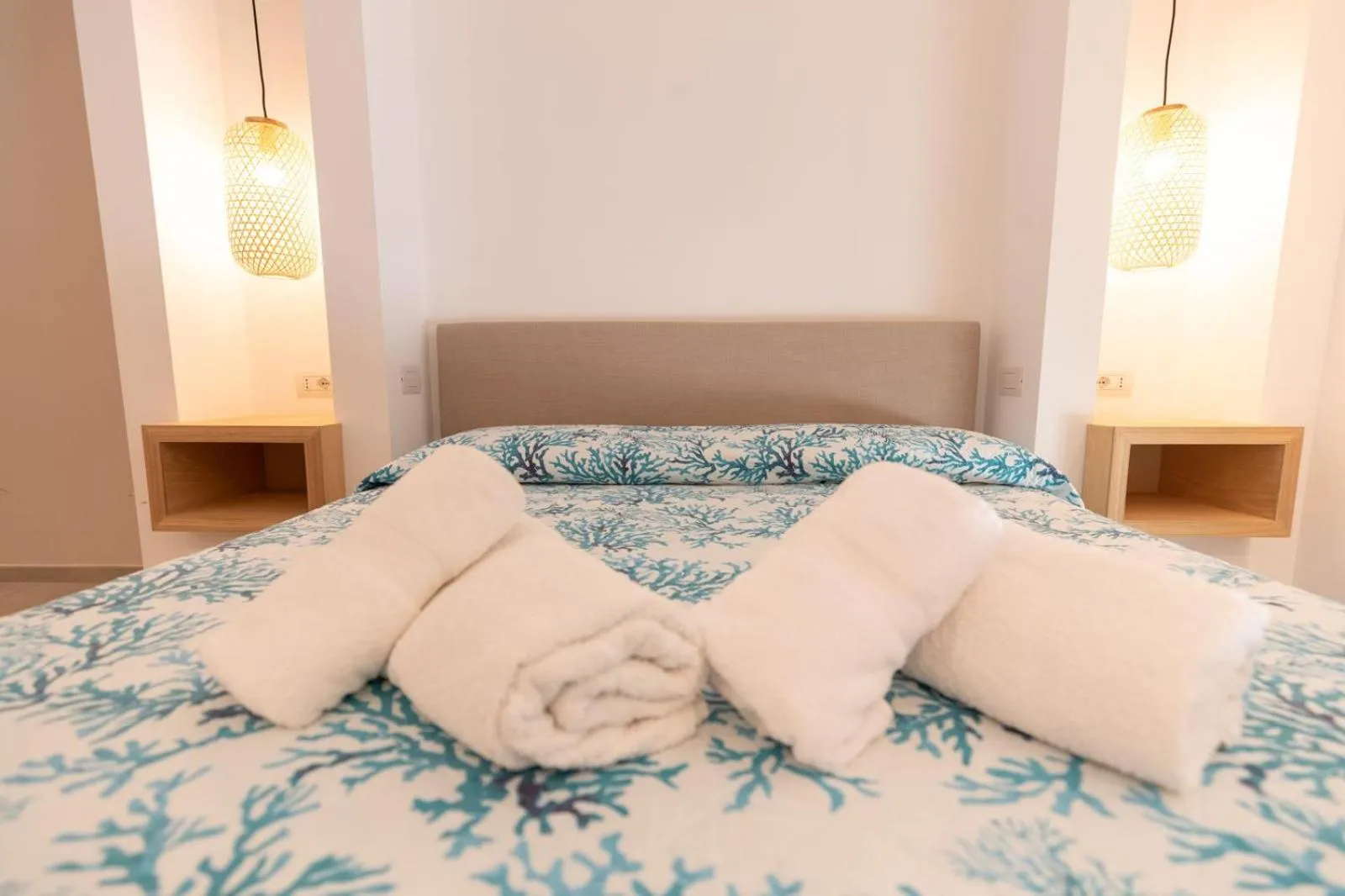 Bed in Antares Rooms and Suites