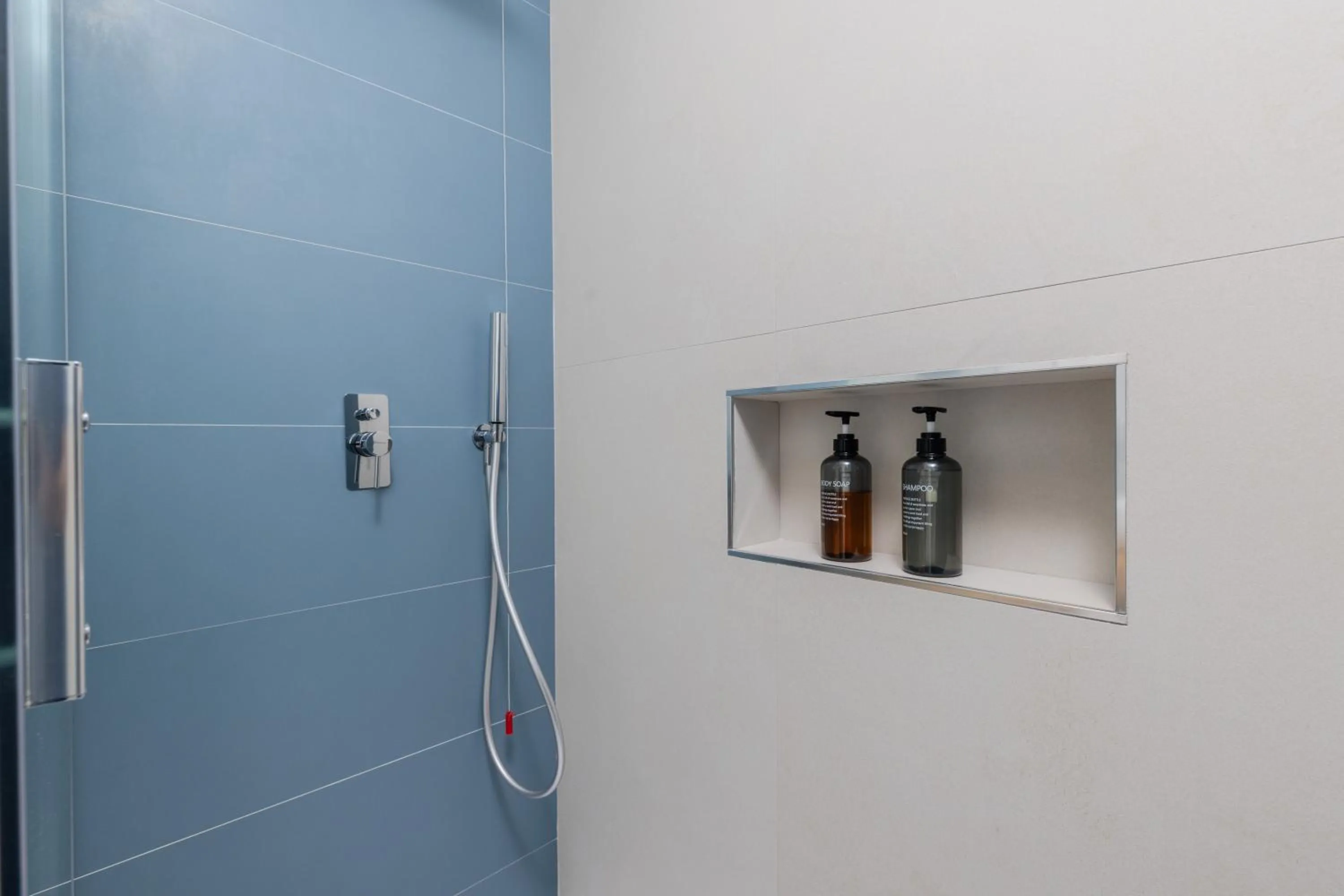 Bathroom in Antares Rooms and Suites