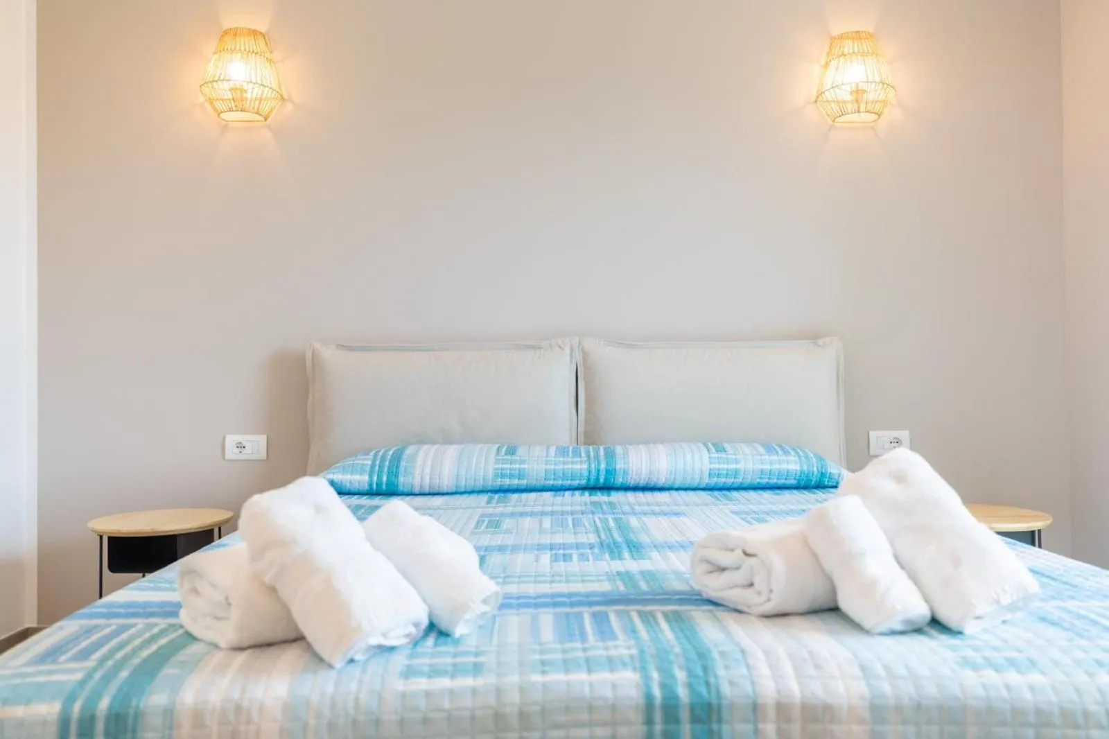 Bed in Antares Rooms and Suites