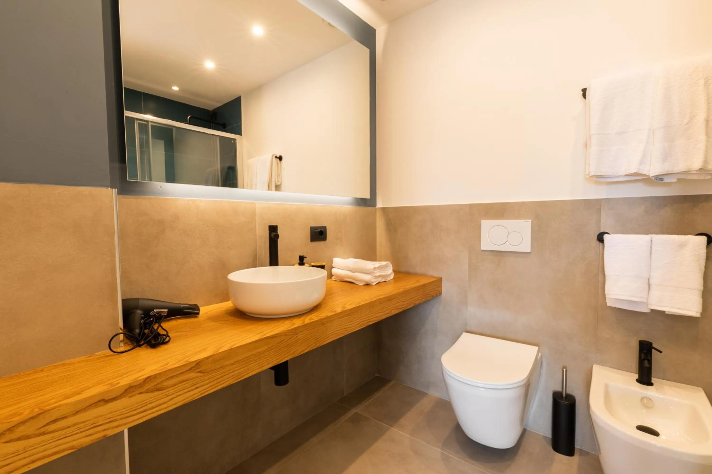 Bathroom in Antares Rooms and Suites