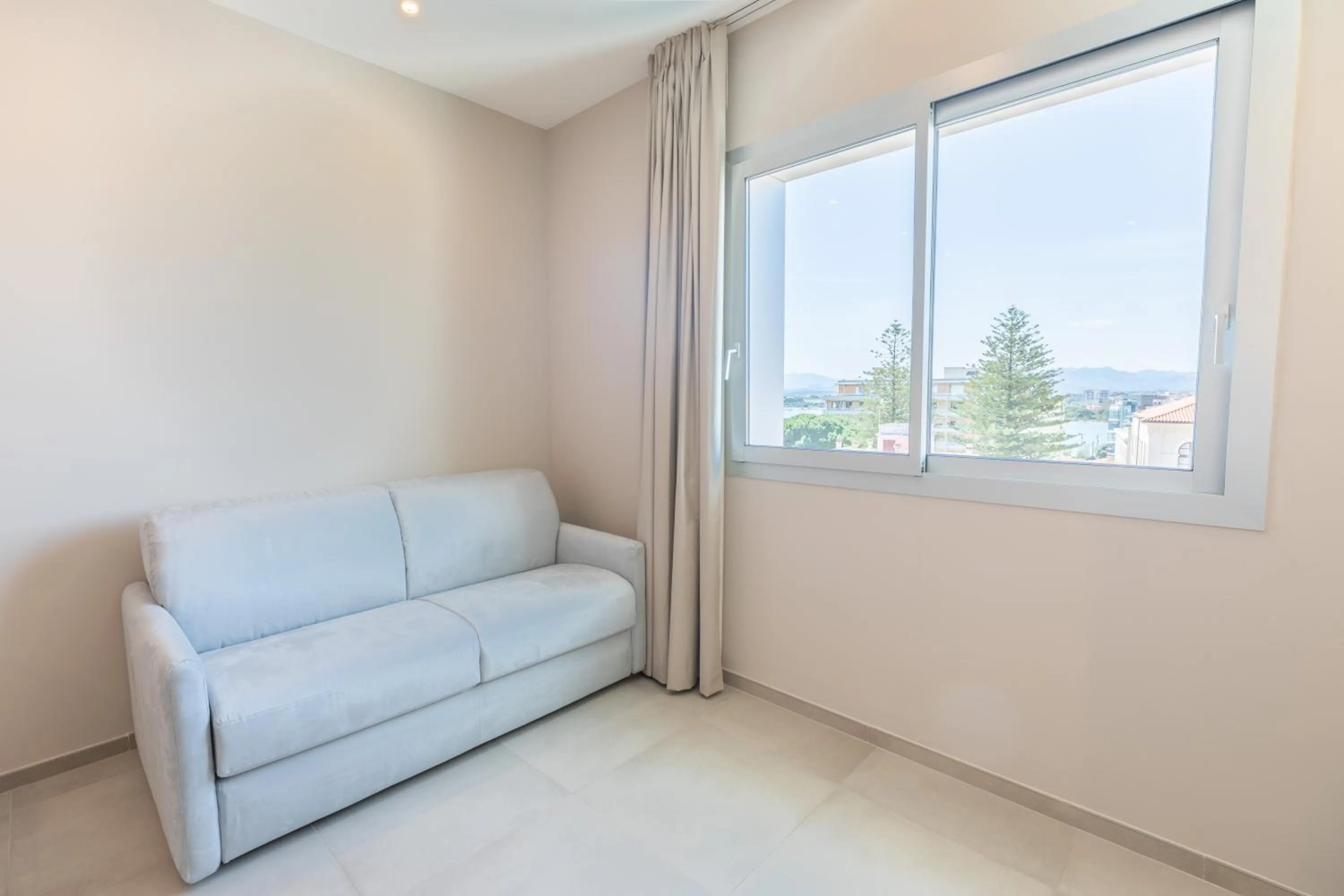 Bedroom in Antares Rooms and Suites