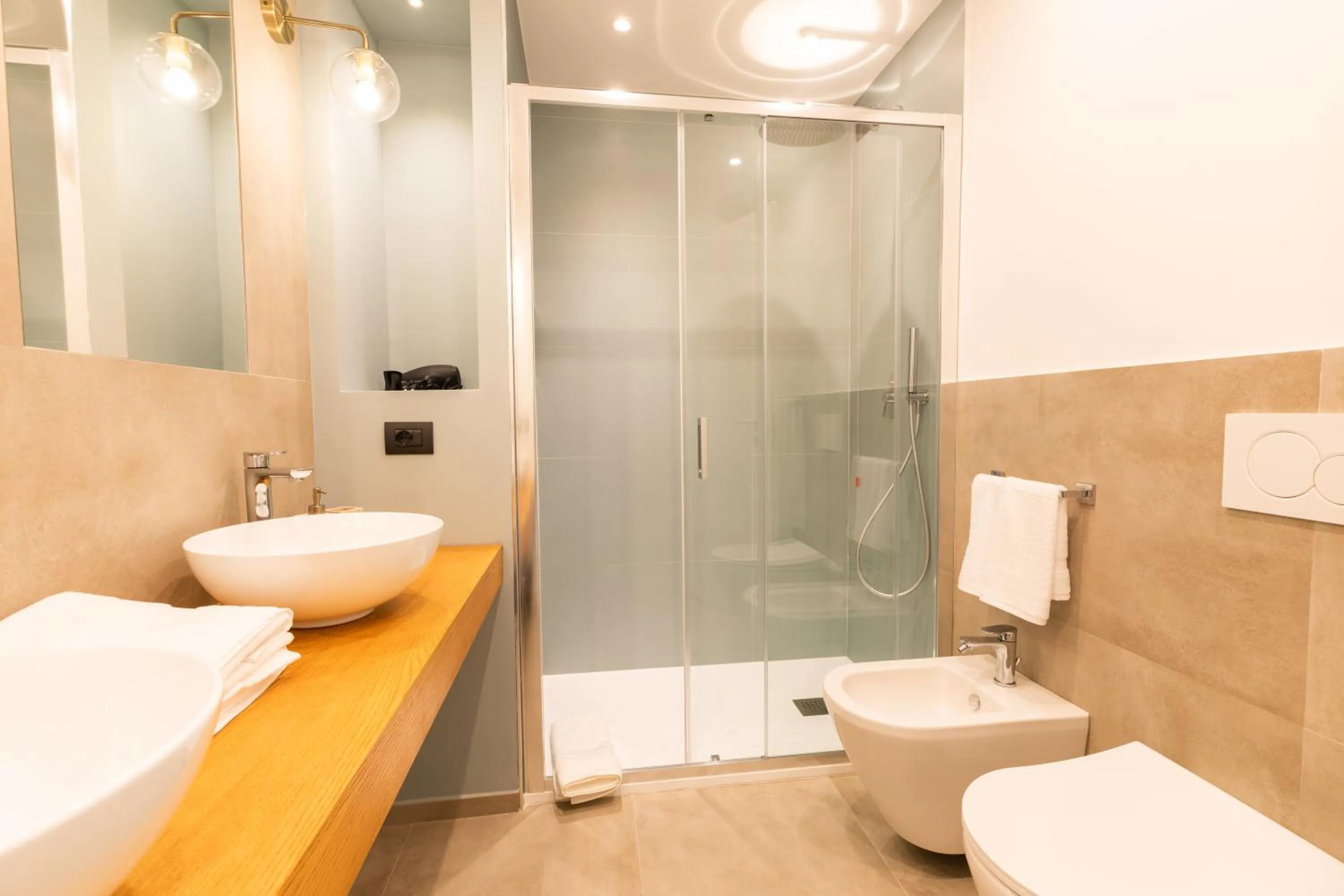 Bathroom in Antares Rooms and Suites