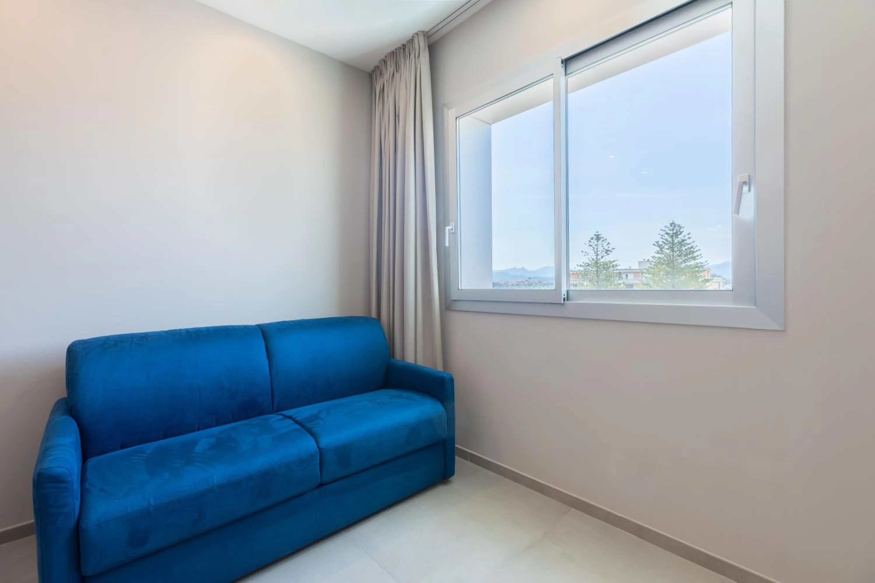 Bedroom in Antares Rooms and Suites