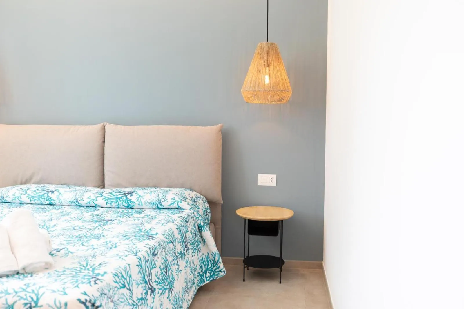 Bed in Antares Rooms and Suites