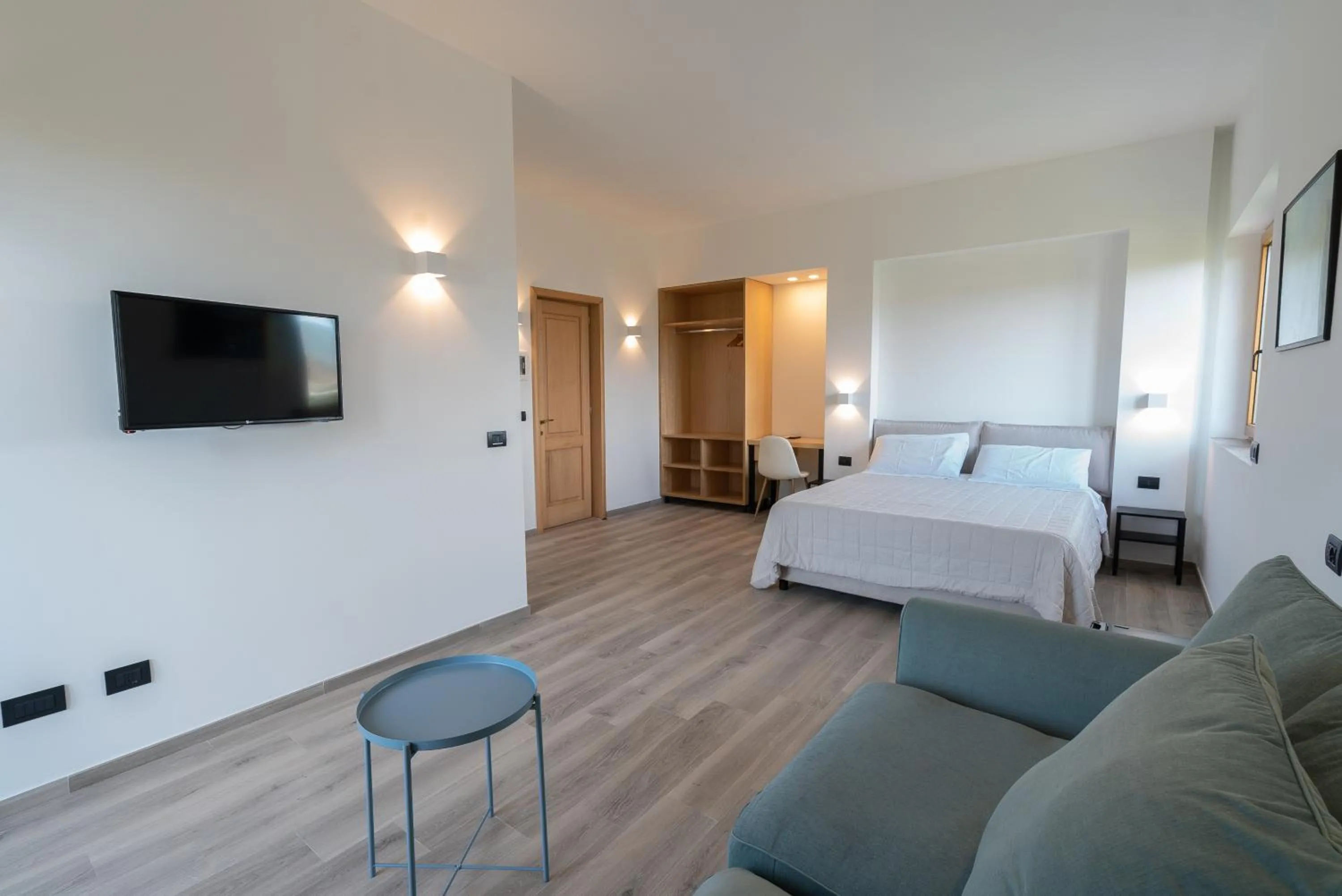 Photo of the whole room, Bed in Antares Rooms and Suites