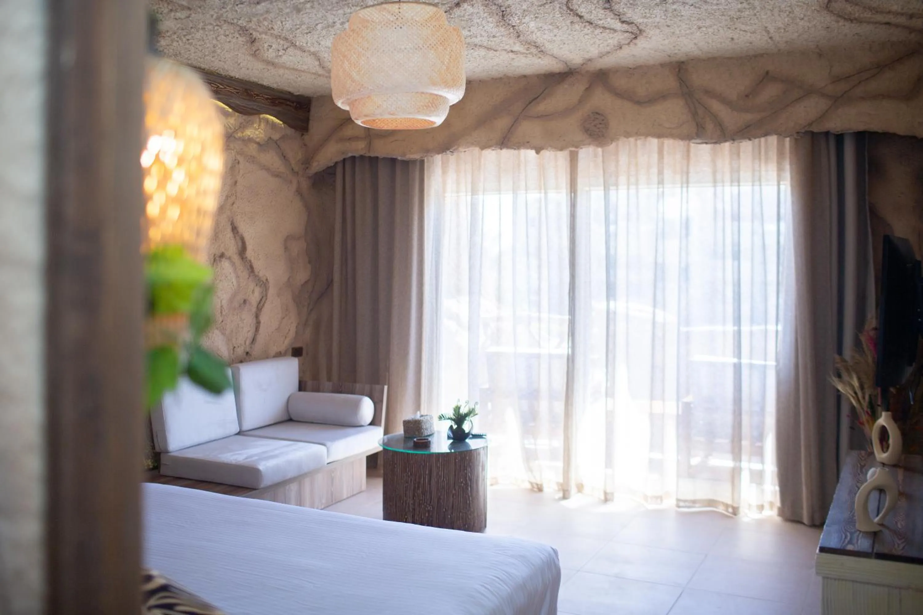 Photo of the whole room, Bed in Caves Beach Resort Adults Only