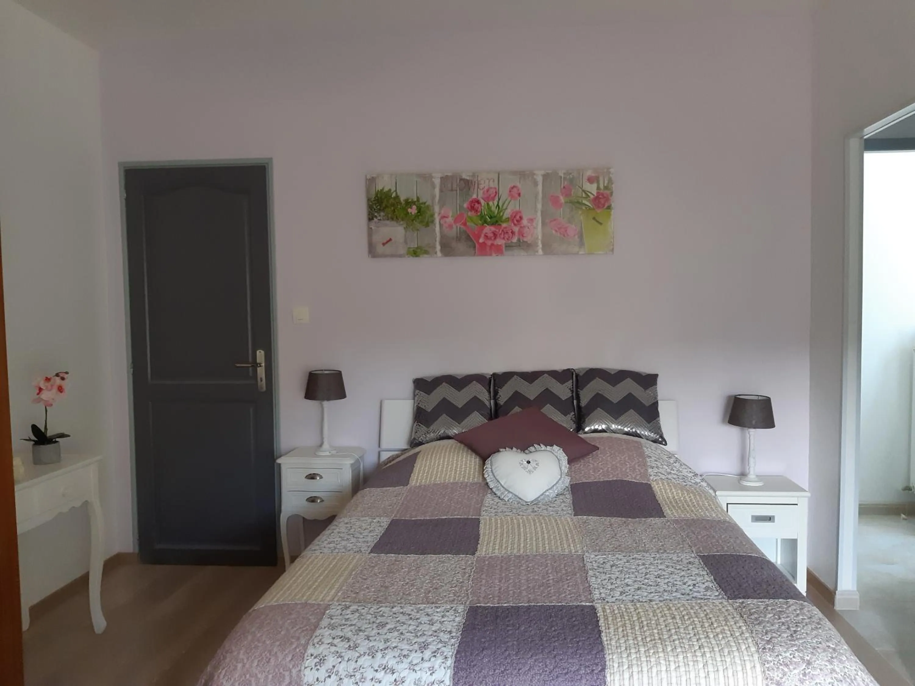 Bed in Chambre d'Hôtes Les Orchidées FUTUROSCOPE CHASSENEUIL POITIERS