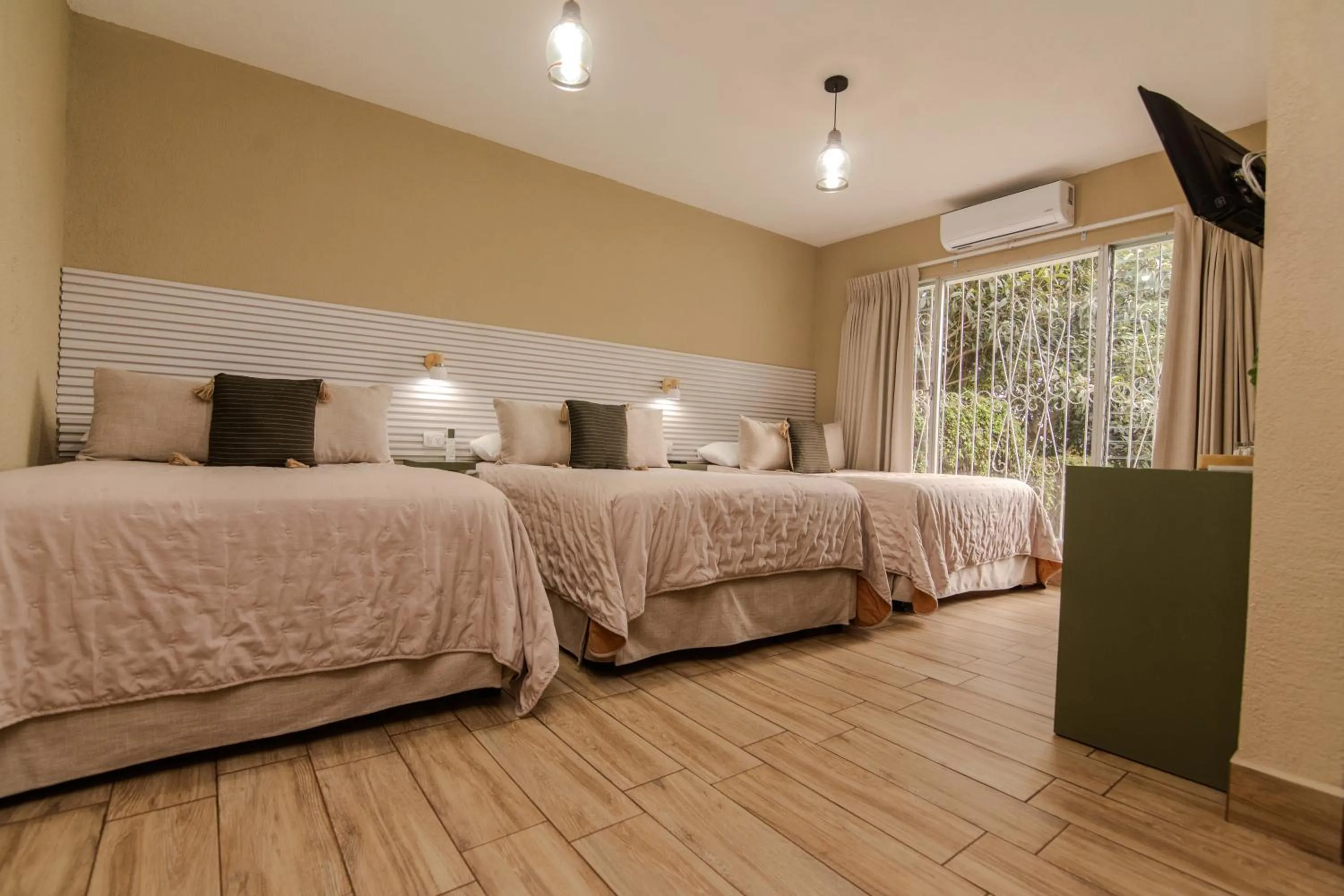 Bed in In & Out Hotel