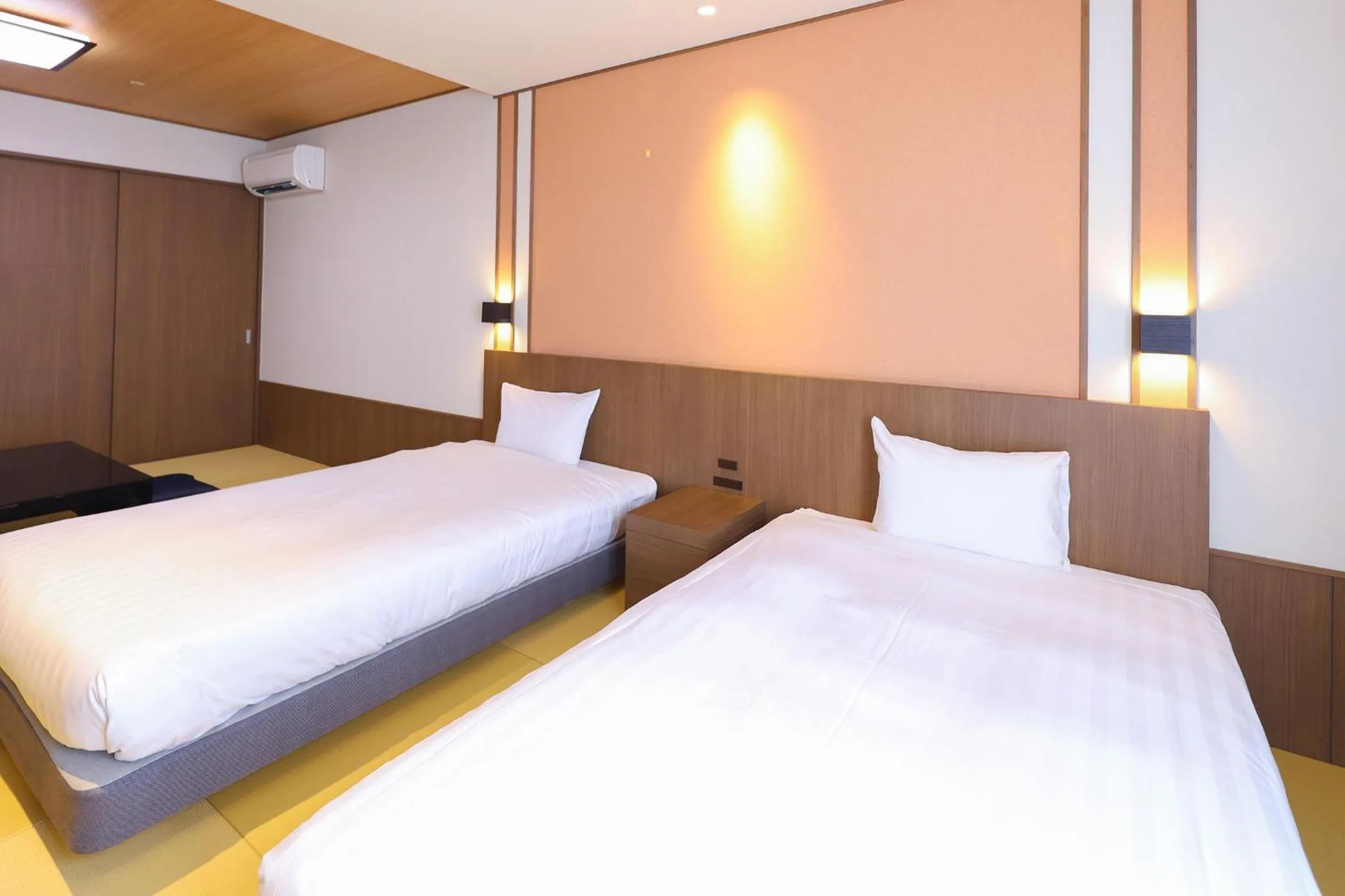 Bed in Ooedo Onsen Monogatari Premium Atami