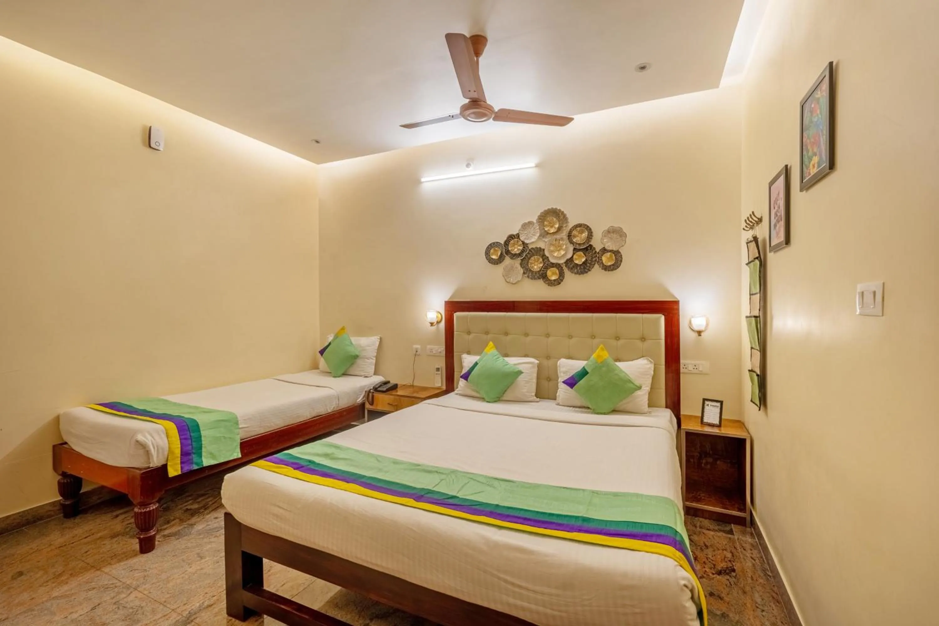 Bedroom, Bed in Treebo Grace Inn, 3 Min Walk From Promenade Beach