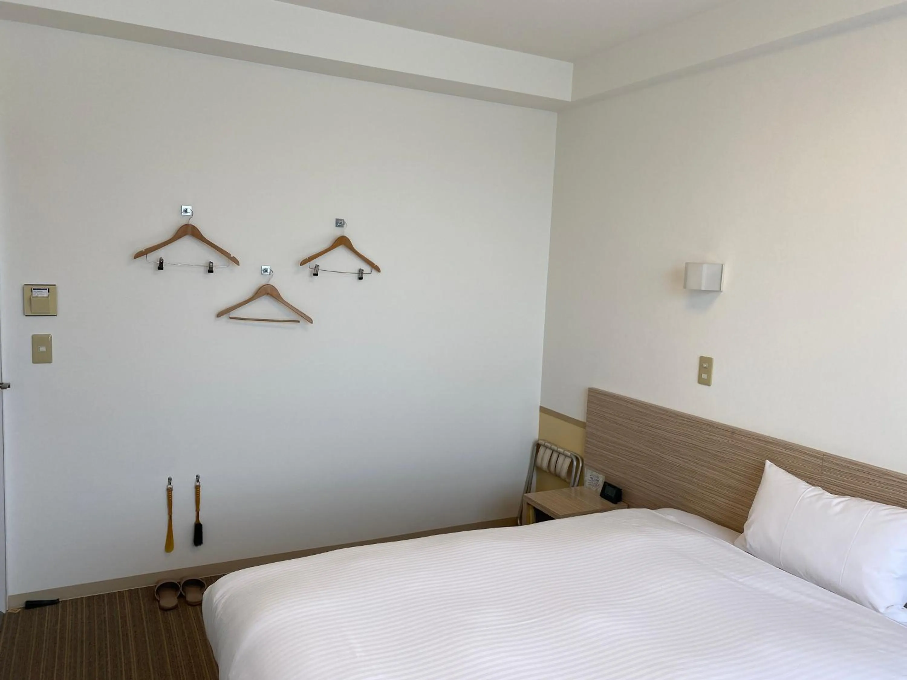 Bed in Smile Hotel Shirakawa
