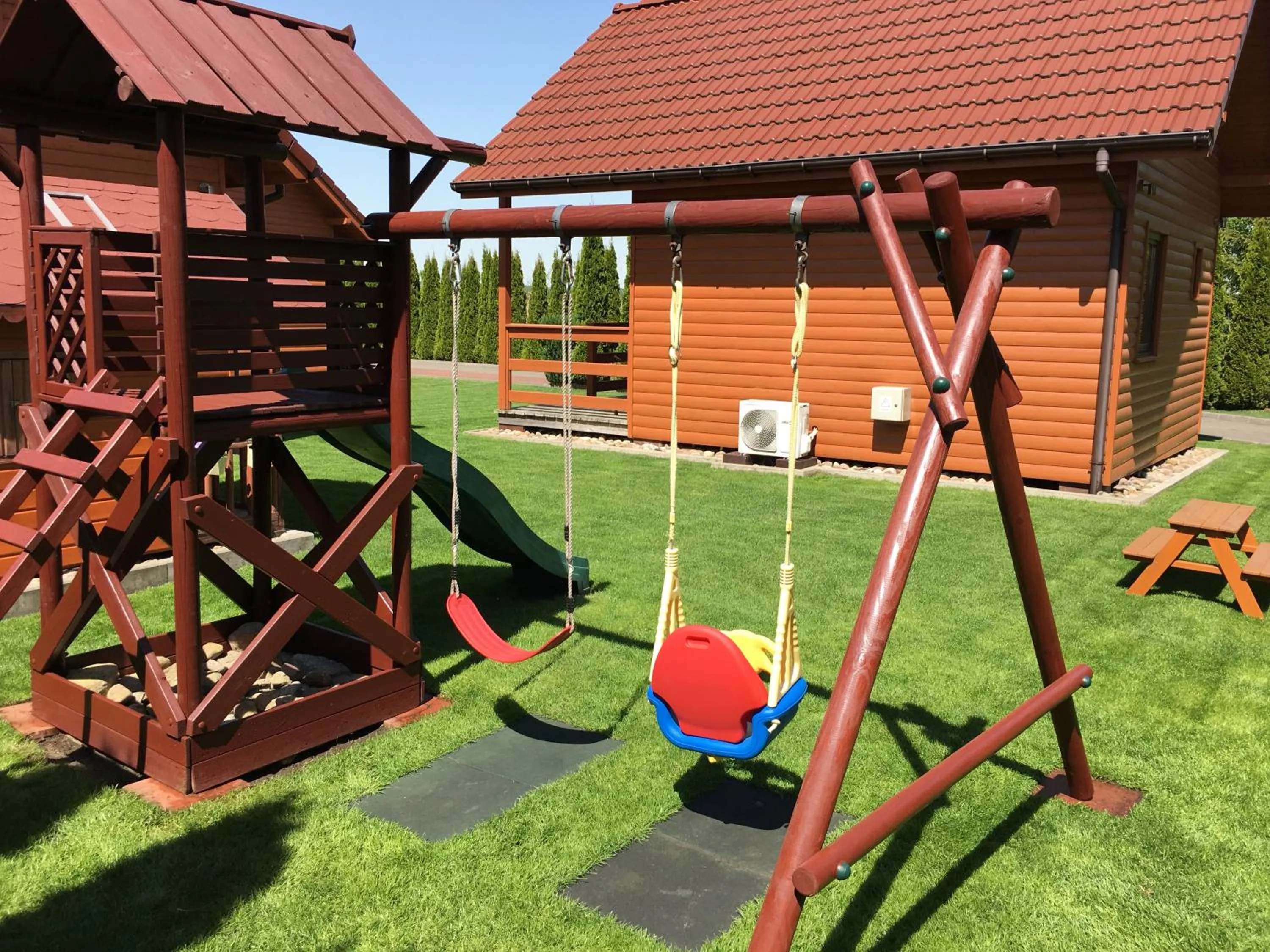 Children play ground in Domki Wczasowe Papaya
