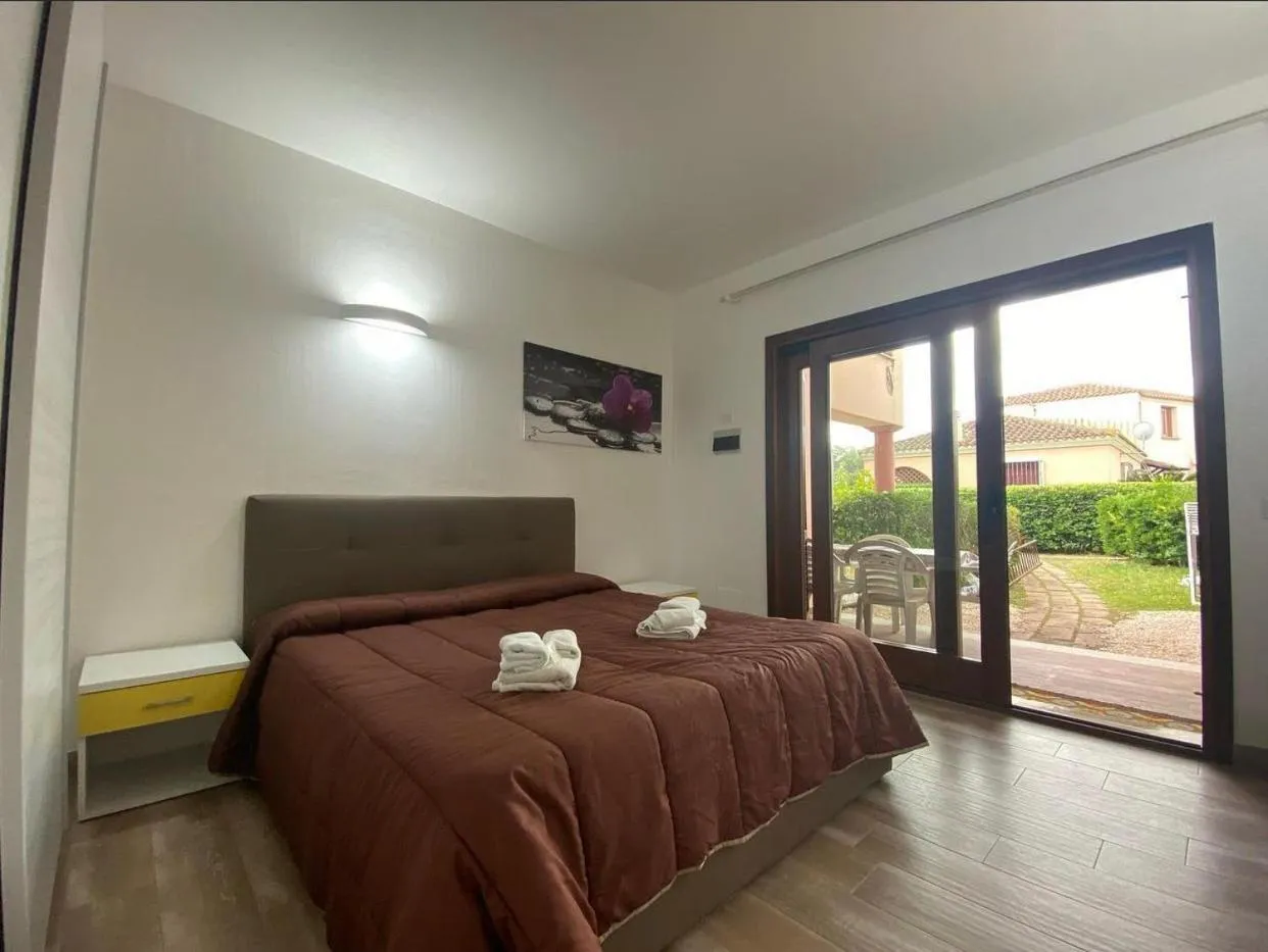 Photo of the whole room, Bed in La Coccinella al mare