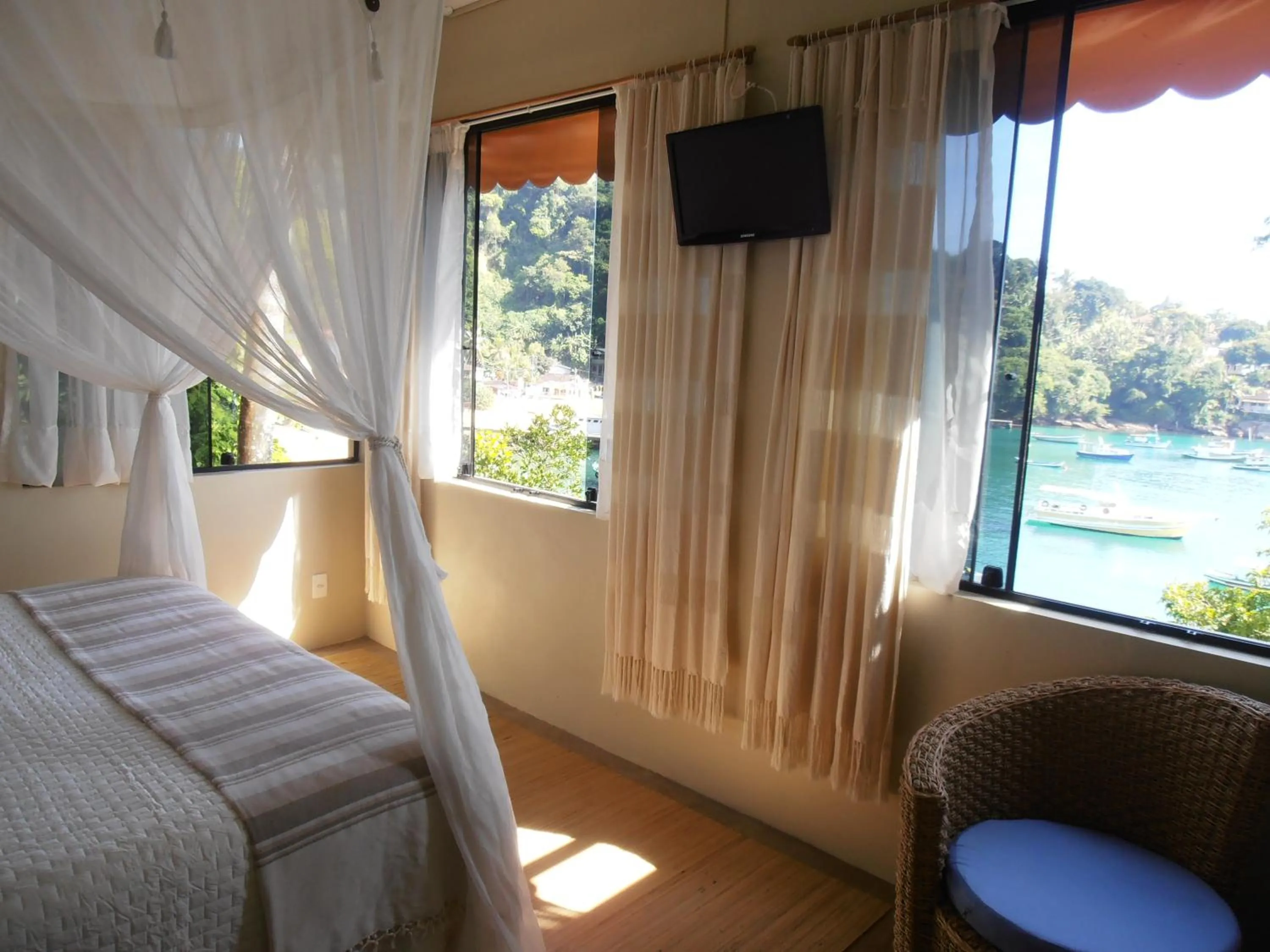 Sea view, Bed in Vila Pedra Mar