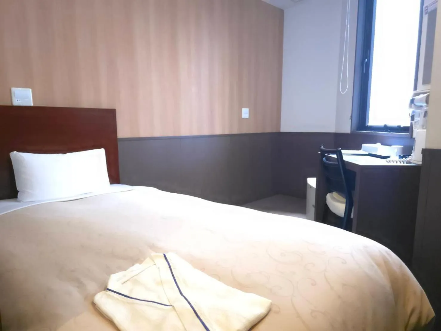 Bed in Hotel Ekichika Nagahoribashi