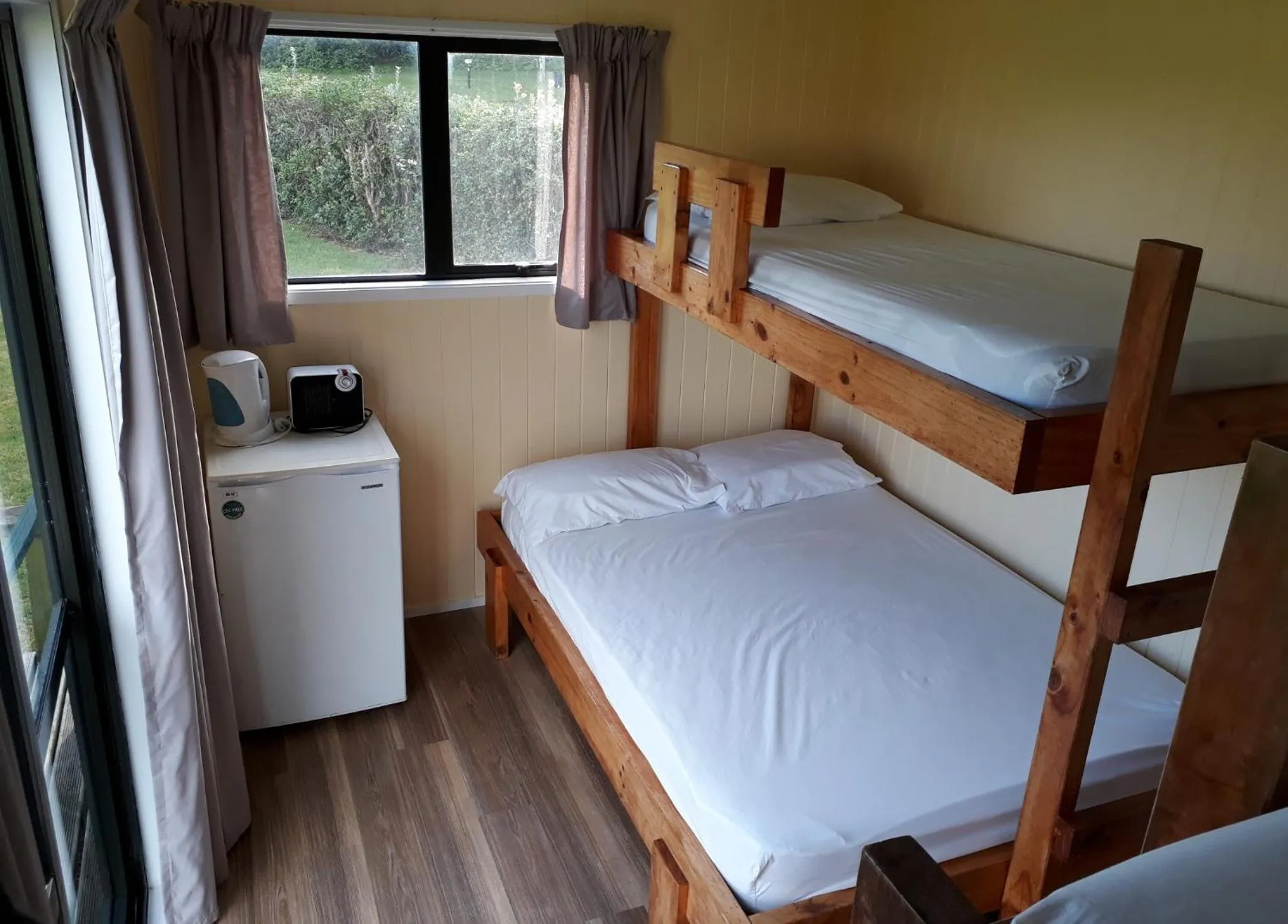Photo of the whole room, Bed in Opunake Beach Holiday Park